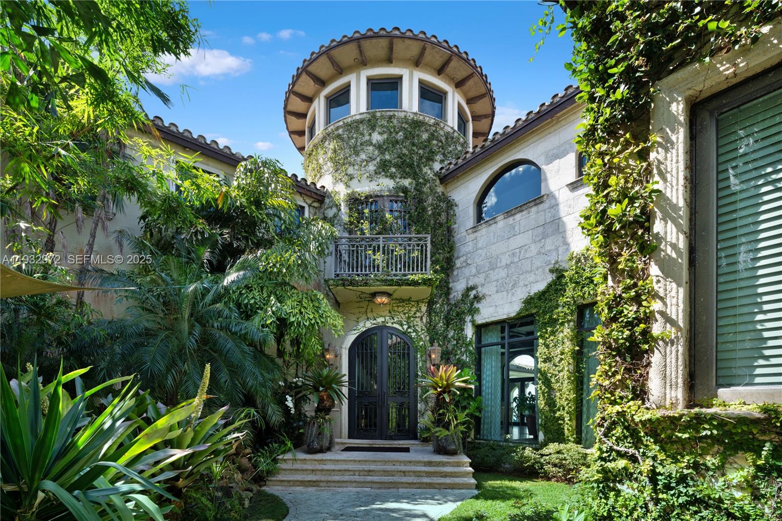 Once-in-a-lifetime opportunity to own the crown-jewel point estate in Bay Harbor.

This iconic Mediterranean three-story waterfront residence sits on a spectacular point with wide-open bay views and exceptional privacy. Featuring an interior elevator, approximately 9,000 square feet of interior living space (public records reflect a different figure), seven bedrooms including staff quarters, eight full bathrooms plus two powder rooms, a private theatre room, and a hidden bar seamlessly integrated into the main living area, the home offers expansive indoor-outdoor living and a dramatic arrival. A five-car garage complements the estate’s resort-style grounds, which include a serene koi pond—ideal for both grand entertaining and quiet retreat. A rare offering with endless potential to enjoy as-is or reimagine into a legacy waterfront estate.