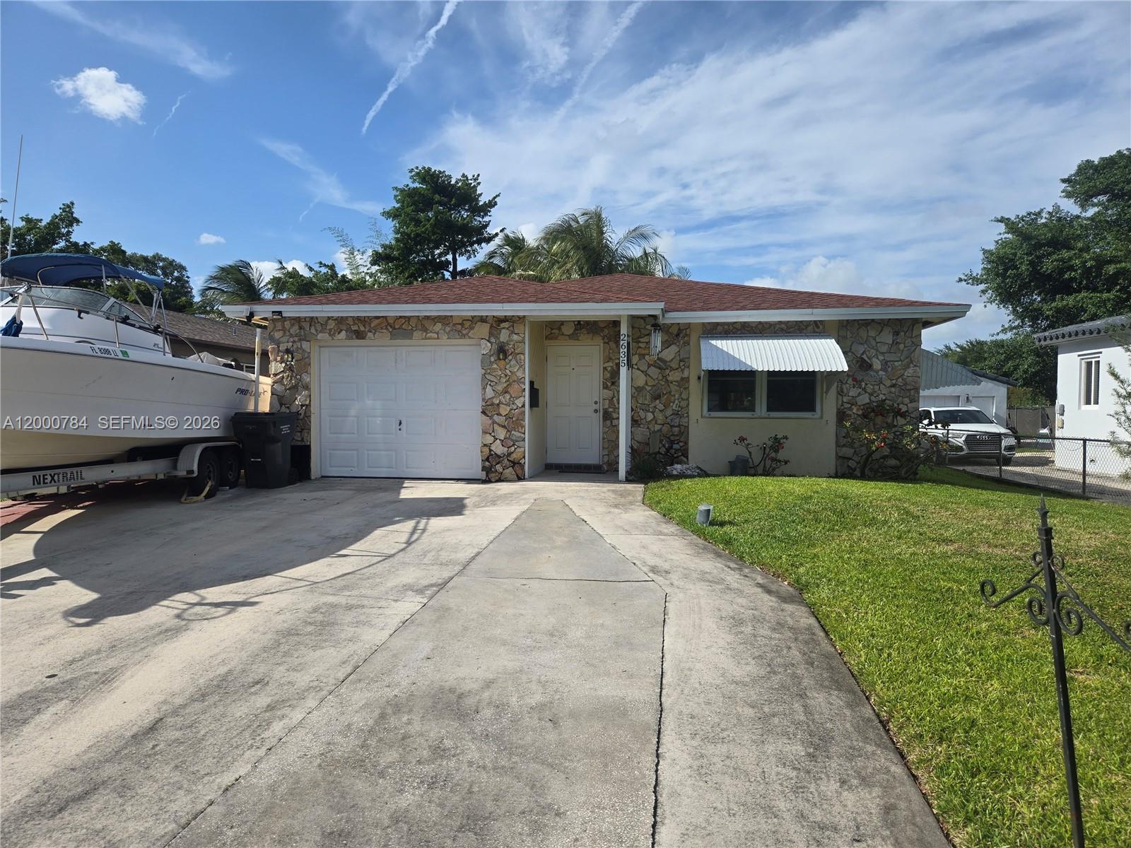 A rare newer construction, charming, carefully maintained house with 3-bedrooms, 2-remodeled baths with a new AC system and an expansive lot designed for elevated outdoor living. Formal living and separate family rooms. Newer roof and water filtration system. Moments from pristine beaches, premier dining, and the region’s most coveted conveniences like major highways and airport. This residence offers the kind of comfort that feels effortlessly unforgettable. Easy to show.