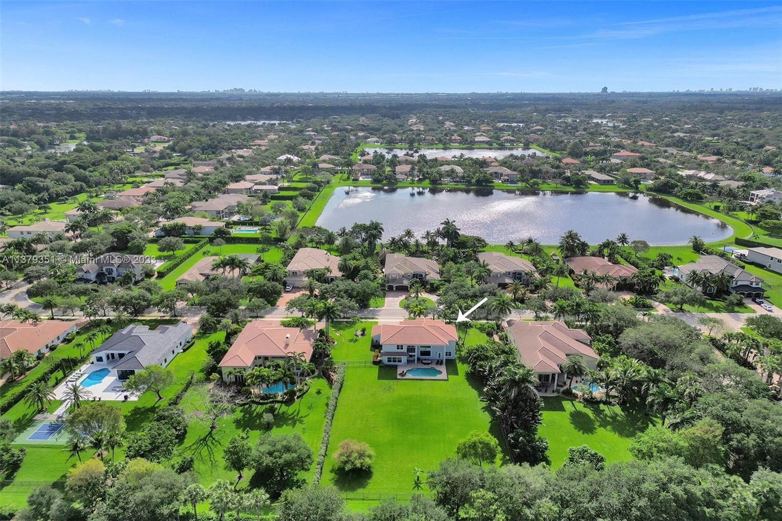 6 bedroom, 5.5 bathroom pool home located in the gated subdivision of Long Lake Ranches in Davie has been totally remodeled featuring modern and high-quality finishes throughout including impact windows and doors! 
 2 Bathrooms located on first floor and 1.5 bathrooms located on ground level.   Gated subdivision of Long Lake Ranches adds an element of security and exclusivity to the property, creating a safe and private environment with a 24/7 security gate. The huge yard is appealing, providing ample outdoor space for various activities, outside entertaining, and potential landscaping opportunities. The 3-car garage is also a practical feature, offering plenty of parking and storage options.  Top School district!