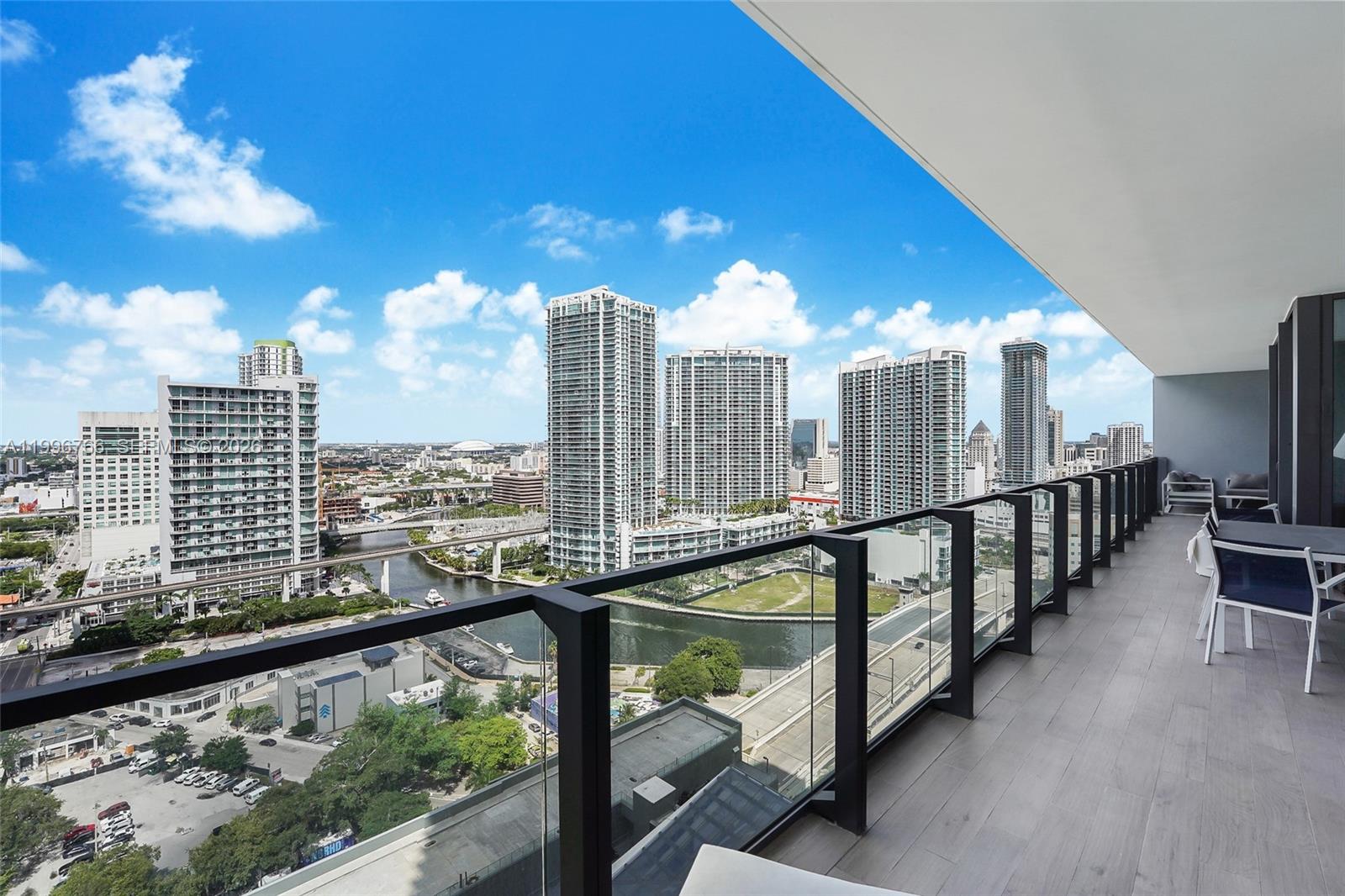 Experience luxury living at Brickell City Centre in this meticulously kept 3-bedroom plus den residence. High ceilings and elegant stone flooring enhance the spacious, sun-drenched interior, featuring a large living/dining area and a gourmet kitchen with Bosch appliances. Each oversized bedroom boasts a private full bathroom, complemented by a versatile den perfect for a home office. A massive terrace spans the entire length of the residence, offering stunning views of the Miami River and city lights. Enjoy world-class amenities: resort pool, hot tub, fitness center, designer party room, and 24-hour attended lobby. Steps from premier shopping and dining, this home offers unparalleled sophistication and convenience in the heart of Brickell. Experience Miami at its finest!