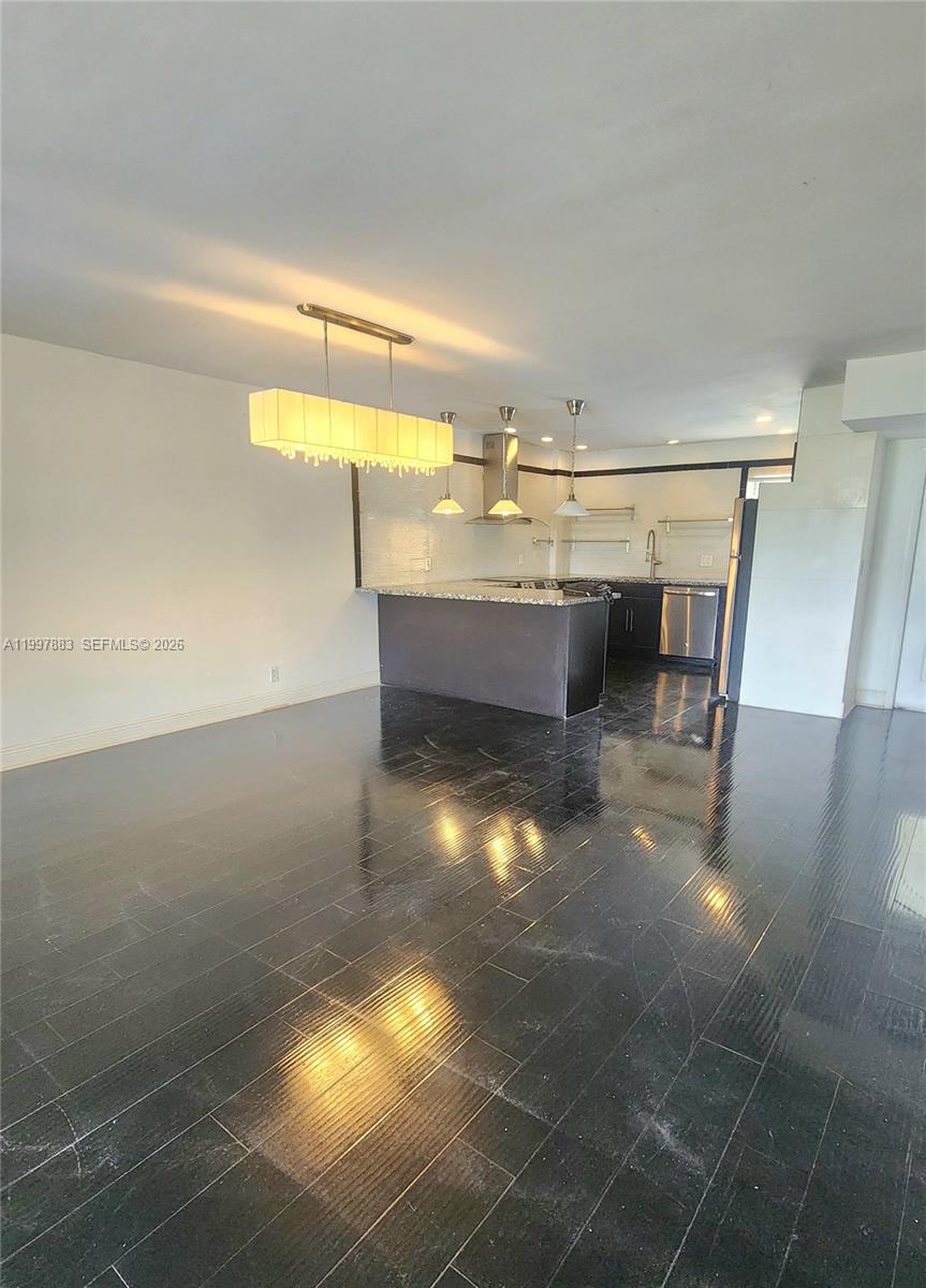 Magnificently maintained, remodeled and well kept. 1 Bedroom, 1.5 Bath condo on second story with lake vistas. All ages condominium. Wood flooring throughout. Bright and clean. Front porch with roll-ups shades and laundry closet. Walk in closet and plenty of storage space. One assigned parking space and guest parking. Pets okay with some weight restrictions. Association maintenance includes water, common areas, maintenance exterior and community pool. WASHER AND DRYER. Plus, small Second room. Very close to restaurants and general stores—Walmart, Aldi, Home Depot, and Walgreens.
