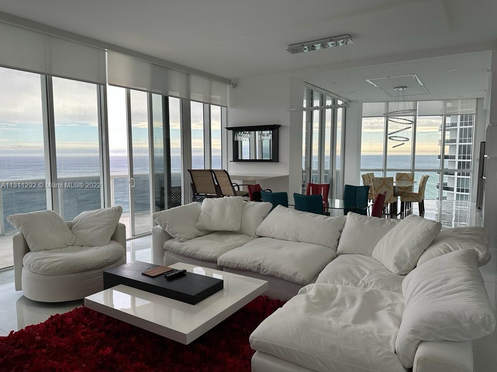 SPECTACULAR RECENTLY RENOVATED Modern Ocean Front Unit with 180 degree views of the Water and largest floor plan in the Trump Towers!! 11 FT HIGH CEILINGS with all remote controlled window treatments and LARGE balcony with DIRECT oceanfront views. Walking distance to retail/restaurants, children's park, and quick drive to South Beach. Located DIRECTLY off of Collins Ave at the start of Sunny Isles Beach. RESORT STYLE AMENITIES INCLUDE FULL BEACH AND POOL SERVICE, GYM, SPA, HEATED POOL, COMMUNITY ROOM, CONFERENCE ROOM, 24 HR CONCIERGE AND VALET. 2 VALET PARKING SPOTS INCLUDED. 
Renting fully furnished AS IS! This is an incredible opportunity to live in one of the best and most open layouts within Sunny Isles! Contact listing agent for showings today!!