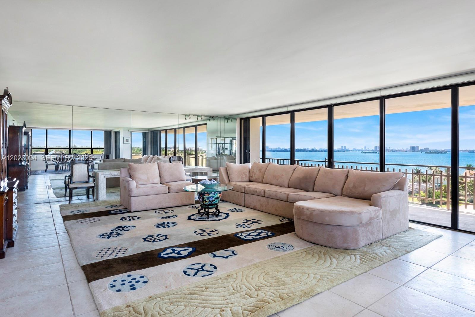 Imagine being able to enjoy both Stunning Sunrises and Breathtaking Sunsets... every day! As you enter this expansive 2215 ft.², 2-bedroom, 2.5-bath + Den residence through its grand double doors and elegant foyer, you are greeted by Sweeping Panoramic Views.  Breathtaking water views from every window!  This Bright Spacious Layout boasts an Eat-in Kitchen, Formal Dining room, over-sized Living Room, & Walk-in Closets.  Feel like you're living in a Resort nestled on a private 23-acre waterfront enclave... this gated community offers Full-Service Building w/ 24hr Security,  newly renovated Fitness Center, Steam Room, Sauna, Heated Pool / Hot Tub, Tennis, and more.  Assigned Covered Parking, COMPLIMENTARY VALET for you & your Guests, plus ADDITIONAL STORAGE!  Minutes from Miami Beach, Downtown, Bal Harbour Shops, Design District.  CABLE & INTERNET INCLUDED