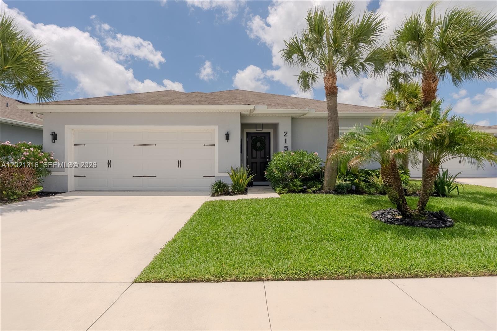 Welcome to this stunning turnkey 4-bedroom, 2-bathroom home in the heart of Fort Pierce! Completely renovated from top to bottom, this move-in-ready beauty perfectly blends modern luxury, comfort, and functionality. Open, inviting layout featuring ceramic flooring in the bedrooms, designer-tiled bathrooms with frameless glass showers, upgraded countertops, a sleek glass kitchen backsplash, high baseboards, zebra blinds, custom shelving, and a stylish built-in bar area perfect for entertaining. Loaded with premium upgrades, this home includes 5 elegant chandeliers, an oversized modern ceiling fan, upgraded indoor and outdoor lighting, epoxy-coated garage flooring, gutters, and upgraded GE appliances, including a French door refrigerator, front-load washer and dryer, plus an additional garage refrigerator. Step outside to your own private backyard oasis featuring beautiful pavers and a spacious, fully fenced yard ideal for relaxing or entertaining. With over $60,000 in upgrades already completed, this home offers incredible value and pride of ownership. Conveniently located near major growth and development, including nearby Cleveland Clinic facilities and the upcoming Buc-ee’s Fort Pierce location, this property is perfectly positioned in one of the Treasure Coast’s fastest-growing and most exciting areas. Low HOA! *Furniture available for purchase* 
NEW FL RESIDENTS COULD FACE 5-YR WAITING PERIOD BEFORE QUALIFYING FOR HIGHER HOMESTEAD EXEMPTION* BOOK YOUR SHOWING TODAY!