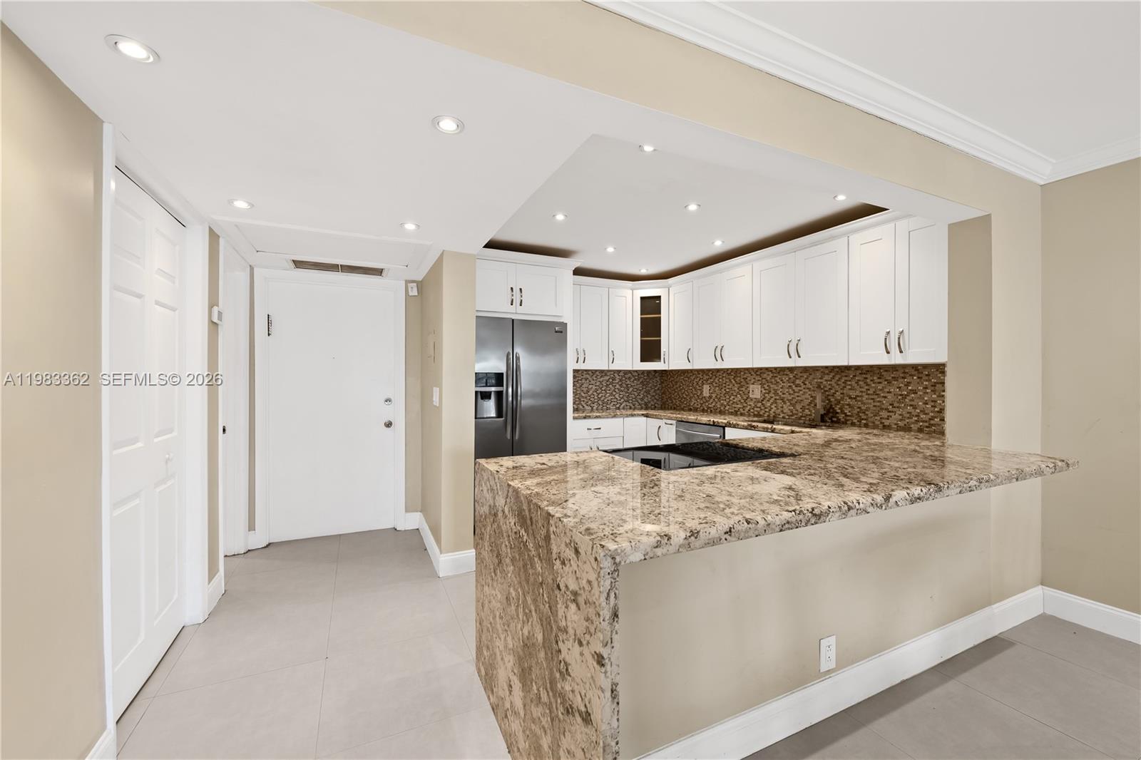 Stunning, fully renovated and furnished 1-bedroom, 1.5-bath residence featuring modern upgrades throughout. The unit offers high-impact windows in every room, including the enclosed porch—ideal for conversion into a second bedroom or home office. Offered fully furnished and available for an annual lease. Enjoy peace of mind in a well-maintained 55+ community, conveniently located near public transportation, Gulfstream Park, shopping, and convenience stores. Just minutes from the beach, Aventura Mall, major highways, and Fort Lauderdale–Hollywood International Airport. The property includes one assigned parking space. 40- and 50-year certifications have been completed. Buyer must sign FIRPTA. Don’t miss this exceptional opportunity to enjoy comfort, convenience, and style in a prime location.