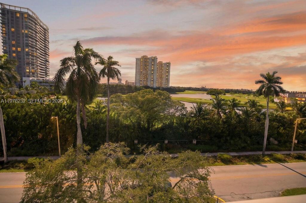 Enjoy panoramic Shell Bay and Diplomat Golf Course views from your enclosed balcony in this spacious Hallandale Beach condo at Fairways Riviera. This top-floor residence features a split floor plan, open living/dining area, tile kitchen floors, ample storage, and a walk-in closet with built-ins. Covered parking and extra storage are included. Residents enjoy a heated pool, gym with bay views, sauna, game room, BBQ/sundeck, and fishing pier. 50-year recertification completed. HOA covers water, cable, Wi-Fi, exterior upkeep, and in-unit pest control. Prime location: 10-minute walk to beaches, shops, and restaurants.