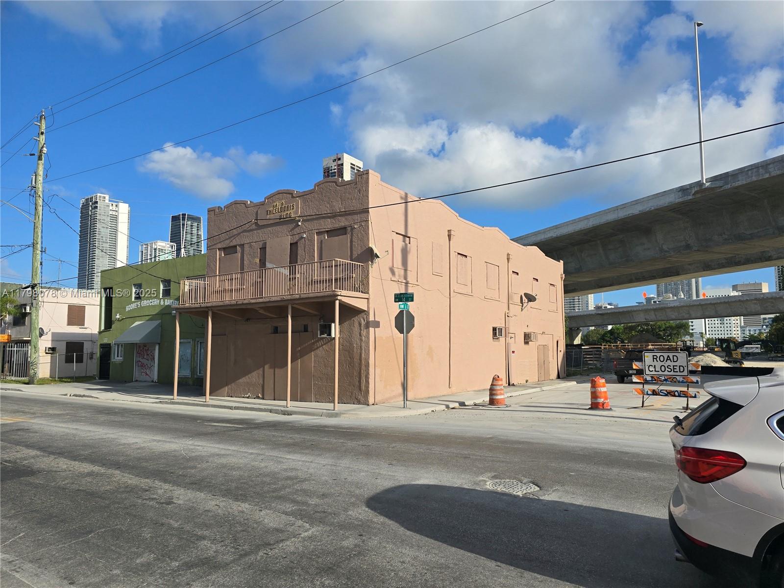 large building in up and coming area has 10 room on second floor