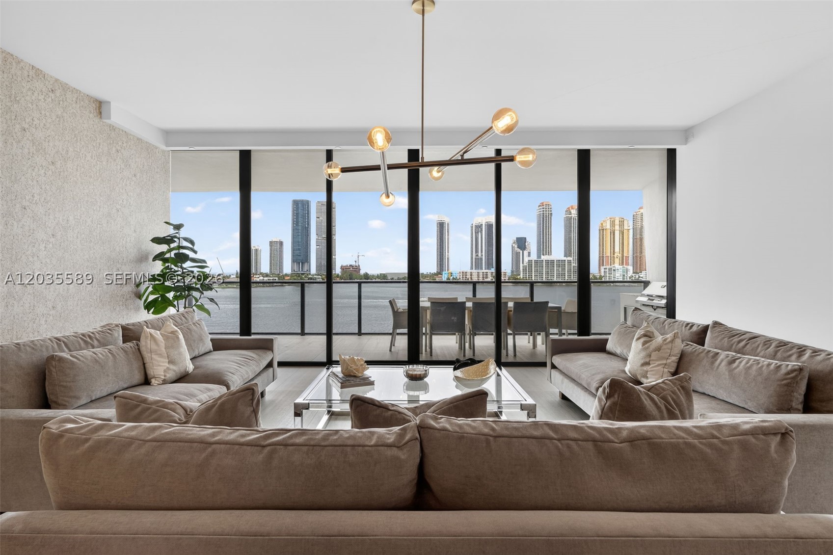 Experience unparalleled waterfront luxury at Privé Island Residences North Tower, one of South Florida’s most exclusive private island enclaves. This exceptional turnkey FURNISHED 3-bedroom, 4.5-bath residence features a private elevator that opens directly into an elegant foyer, revealing breathtaking panoramic water views from every room. Designed for both grand entertaining and everyday comfort, the residence offers a spacious formal living room, dining room, and an additional family room, all framed by floor-to-ceiling glass that captures the stunning ocean, Intracoastal and skyline views.

The unit has two expansive terraces with a summer kitchen create a seamless indoor-outdoor lifestyle, while the thoughtfully designed floor plan includes generously sized bedroom suites, a luxurious primary retreat, and a full utility/laundry room. Residents enjoy an unmatched collection of world-class amenities, including a private marina, resort-style pools, tennis courts, a state-of-the-art fitness center, full-service spa, concierge services, and 24-hour gated security. Perfectly situated just minutes from Aventura’s premier shopping, dining, and entertainment, this extraordinary residence embodies the very best of luxury waterfront living.