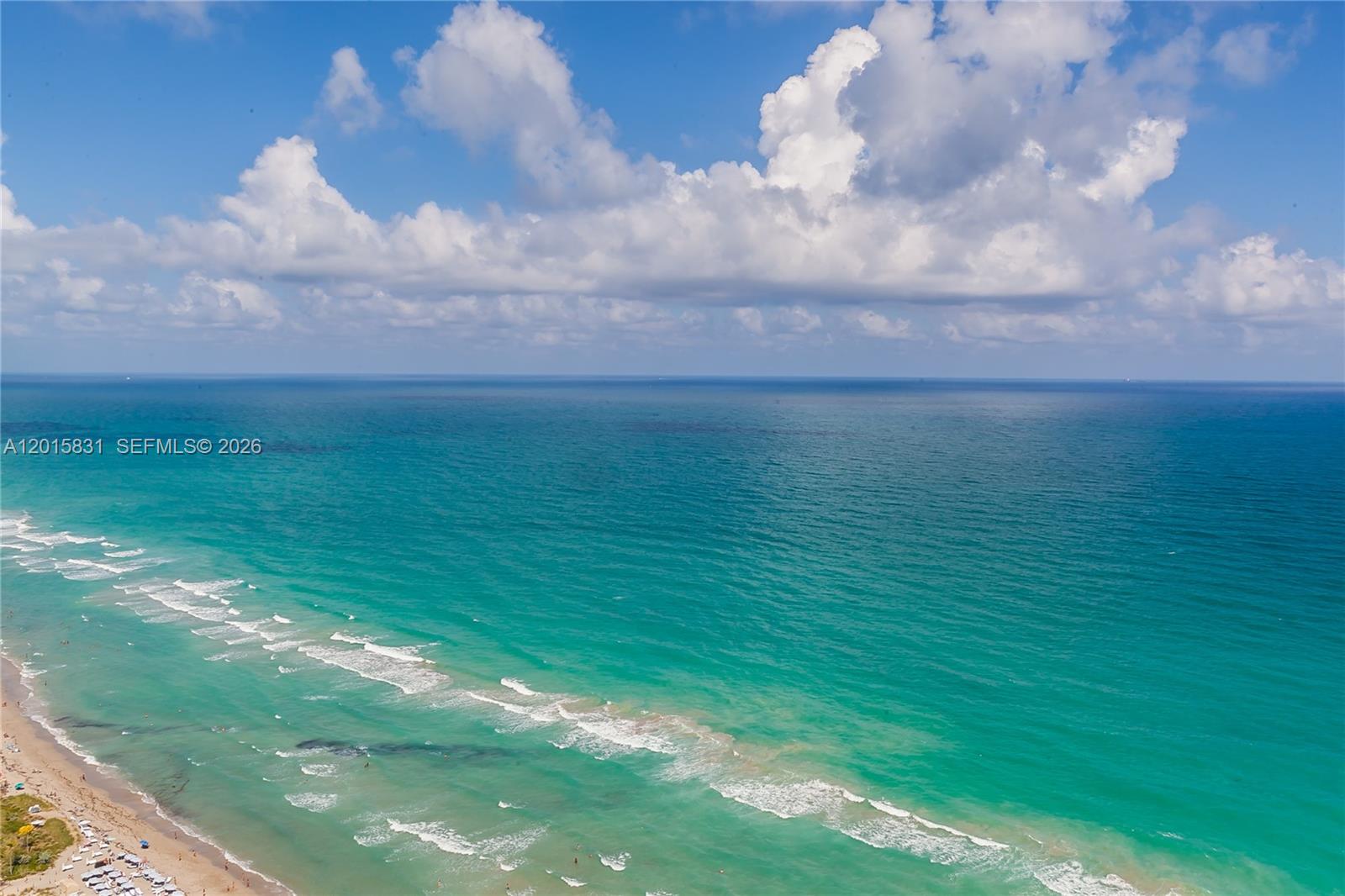 Stunning 2-bedroom + den, 2-bath residence located on the 37th floor with sought-after northeast exposure, offering breathtaking ocean, Intracoastal, and city skyline views. Beautifully furnished and professionally decorated, this spacious unit features elegant porcelain flooring throughout, floor-to-ceiling impact glass windows, and a private balcony perfect for enjoying sunrise and sunset views. The open European-style kitchen is equipped with stainless steel appliances, granite countertops, and ample cabinetry, ideal for both everyday living and entertaining. The primary suite offers a king-size bed and generous closet space, while the second bedroom and den each include queen-size beds for added comfort and flexibility. Located in the prestigious Beach Club oceanfront community with world-class resort-style amenities including multiple pools, state-of-the-art fitness center and spa, full-time concierge, valet, beach service, and 24-hour security. Excellent location close to Aventura Mall, Gulfstream Park, fine dining, and major airports.