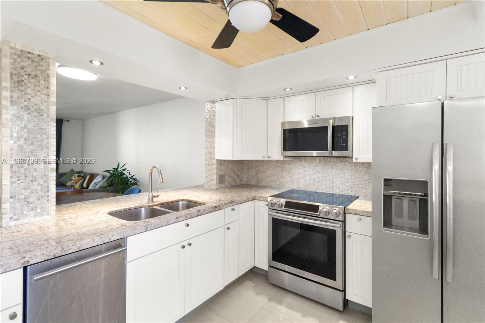 This fully renovated 2-bedroom, 2-bathroom condo is located in the heart of Hallandale and can be rented immediately after purchase. All ages welcome, HOA of $604 per month and no special assessments — all have been paid in full. The interior features ceramic tile flooring throughout, updated kitchen and bathrooms, and an enclosed balcony, offering pool views and flexible use as a home office. Conveniently located within walking distance to shopping, dining, plazas, and grocery stores. Just 1 mile from the beach, 2 miles to I-95, and minutes from Gulfstream Park & Casino. Affordable coastal living with strong rental flexibility. Move-in ready and ideally located near the beach.
