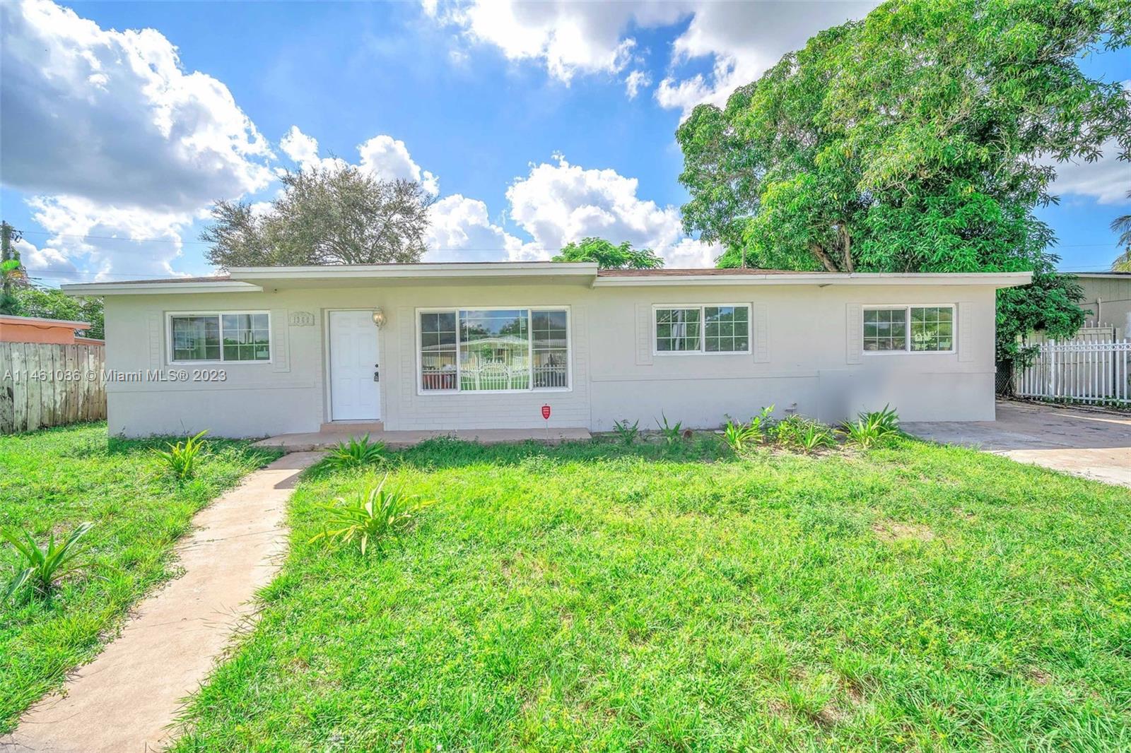 Beautifully Updated 5 bed/ 3 bath Home in Central Location. This home features a security fence and large yard with POOL and mango tree.This home is perfect for entertaining or as an investment property. Located near beautiful community center only 1 minute away from major high way.