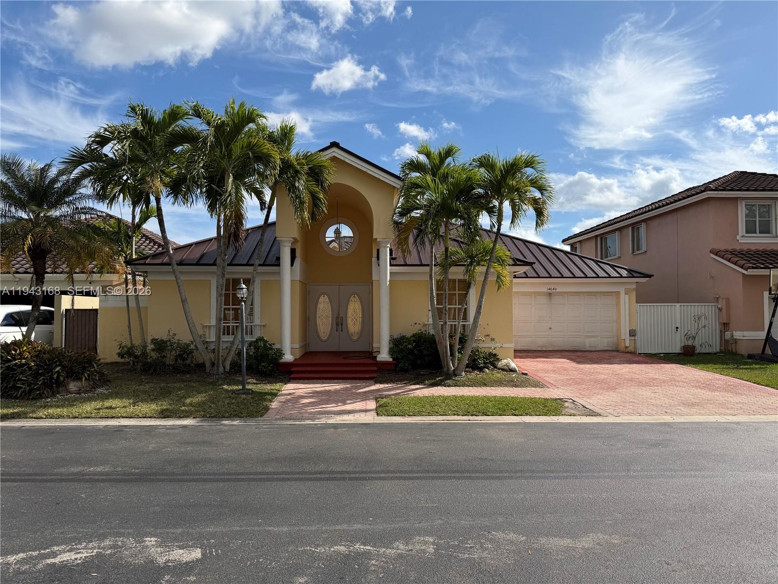 Beautiful waterfront home located in the exclusive Point community of Three Lakes. NEW METAL ROOF 2026! This spacious residence features 4 bedrooms, 3.5 baths, a large loft with additional bath, formal living and dining areas, and a private dock accommodating up to 19-ft watercraft/jetskis. Enjoy resort-style amenities, 24-hour security, and exceptional community facilities. Appointment required.