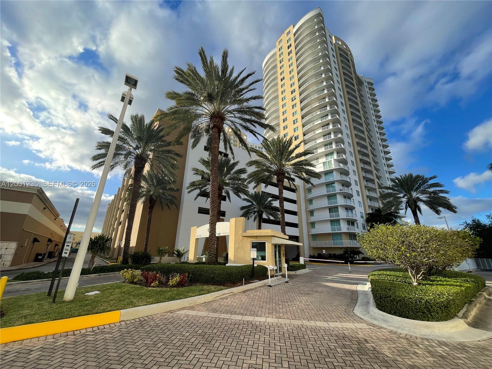 3 bed/2bath with 1,481 sqft of living area. Wood floors throughout. Master features 2 walk in closets. Every bedroom has access to balcony. Views of Diplomat golf club and lake. Gated community with state of the art amenities including pool, game room, gym, business center, theater, tennis courts. Close to beach, starbucks, panera, winn dixie and restaurants. Water, cable and internet are included. Rented until 11/2026 $3,150/month great tenant!