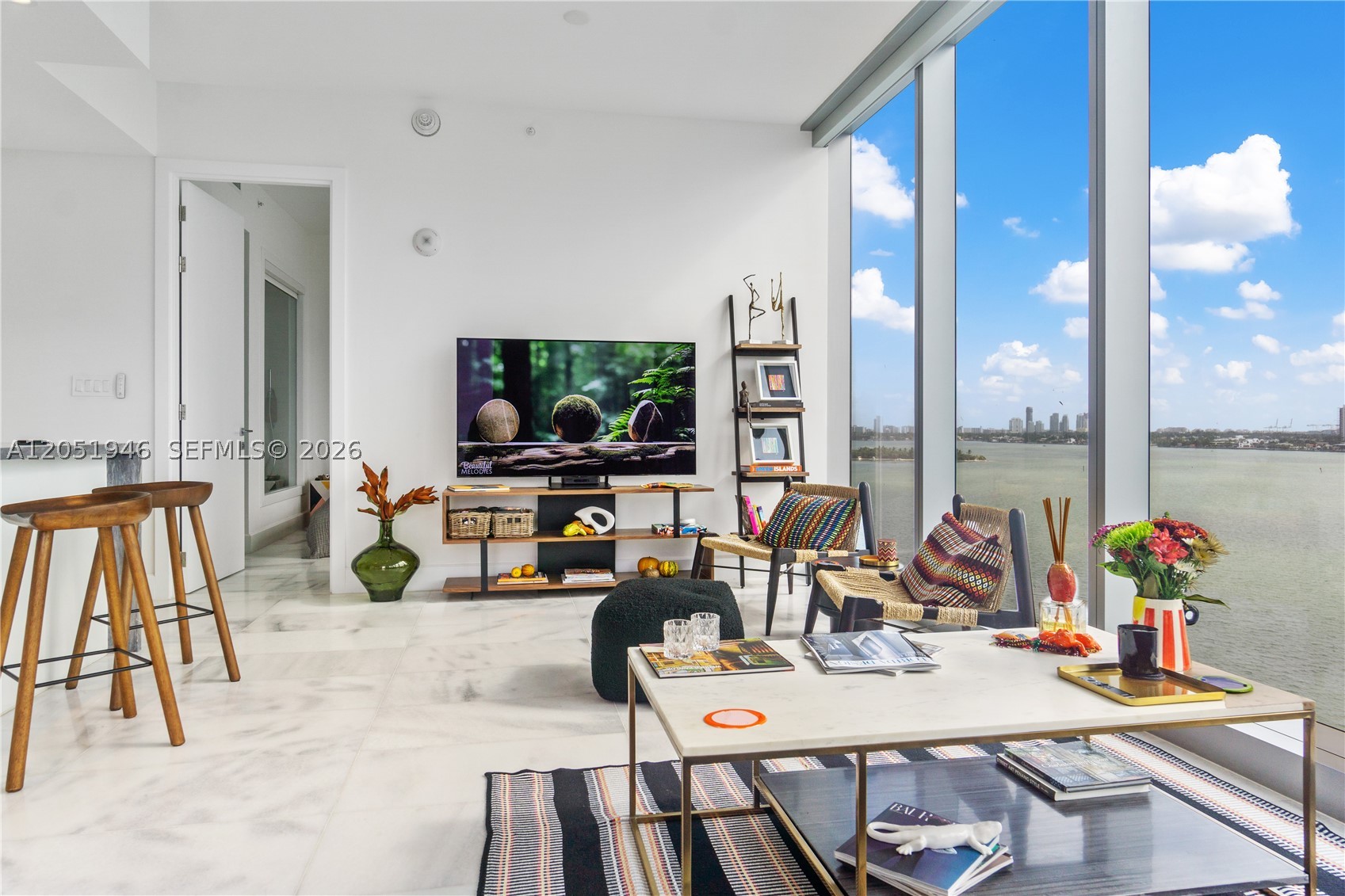Enjoy tastefully furnished brand new 2 bedroom+ 2 bath unit at the newest, trendiest, waterfront luxury tower MISSONI BAIA located in Edgewater! This 57 story tower includes exceptional amenities with 1 Olympic sized pool,1lounge pool,1 sunrise pool,nail/salon room, clubroom, children playroom, dog-spa, cabanas, tennis courts, bayfront terrace featuring an infinity-edge pool, a fitness center and wellness spa.Lots of fitness, aquatic, social classes and gatherings. Walking distance to the Miami Vibrant Lifestyle in Design District, Wynwood, Midtown,Downtown and South Beach.The Unit has Biscayne Bay and city views overlooking the pool deck area and is equipped with top of the line finishes, appliances, marble flooring. Inhouse personal concierge,valet, AVAILABLE FOR 6 MONTHS, UNTIL JANUARY 2027.
