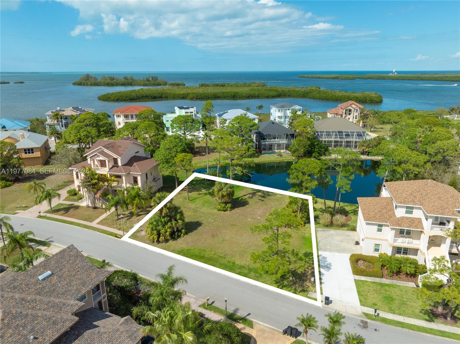 Build your dream home on this 0.30-acre vacant residential lot located on Harbour Watch Cir in the desirable coastal community of Tarpon Springs. This spacious homesite offers an excellent opportunity to own property in a well-maintained gated neighborhood known for its beautiful surroundings and upscale homes. Enjoy the peaceful atmosphere while still being conveniently close to local amenities, including beaches, marinas, golf courses, shopping, and dining. The area is also just a short drive from the famous Sponge Docks and provides easy access to nearby cities such as Tampa.