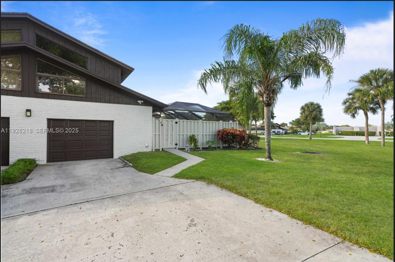 Discover comfortable and refined living in this spacious 3-bedroom, 3.5-bath townhome in the sought-after Boca Gardens community. This well-kept residence offers a functional layout and a 1-car garage with washer and dryer. The highlight is the beautifully redesigned, screened-in patio featuring marble flooring, an outdoor kitchen, and a private hot tub—an ideal indoor-outdoor retreat. Enjoy access to the community’s country club, complete with a pool, tennis court, gym, and walking paths throughout the neighborhood. Perfectly positioned just off State Road 7, minutes from Boca Raton’s best shopping, dining, and conveniences.