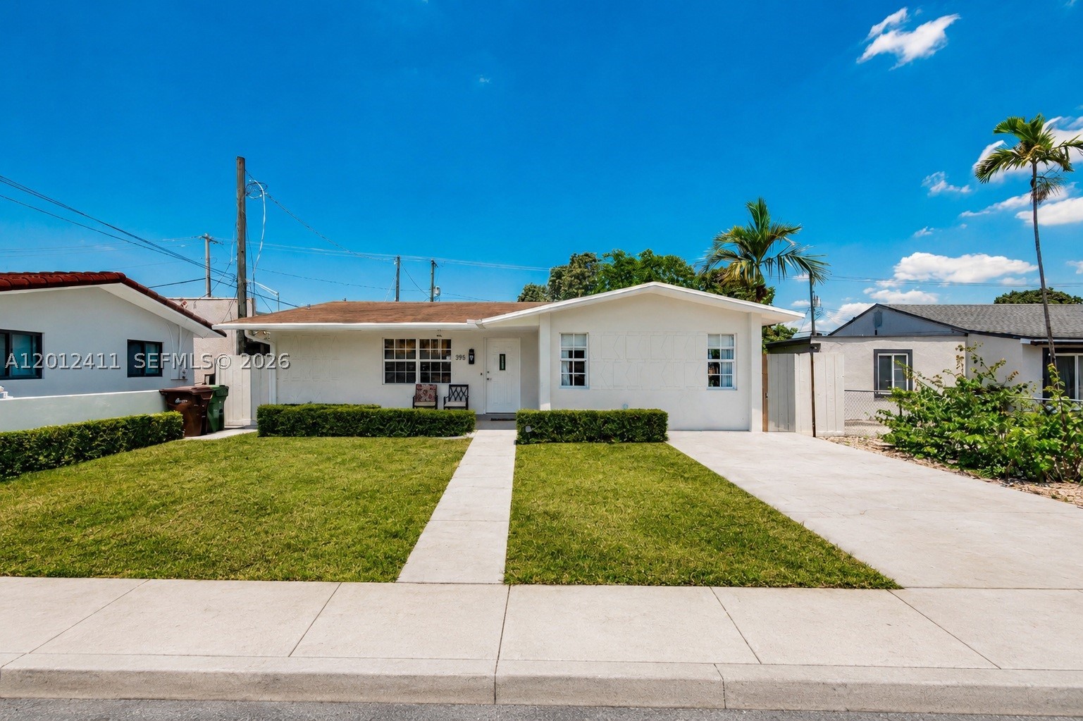 Beautifully updated 4-bedroom, 2-bathroom home in a prime Hialeah location! This fully renovated property offers a spacious and versatile layout, including a bright sunroom that can be used as a 5th bedroom, office, or additional living space. A separate utility/mudroom with private side entrance adds extra convenience. Upgrades include new flooring, modern appliances, upgraded lighting, updated electrical, and fresh interior paint throughout. Enjoy a spacious backyard and patio—perfect for entertaining or relaxing. Ideally located near top-rated schools, shopping, dining, and major highways. Move-in ready and a must see!