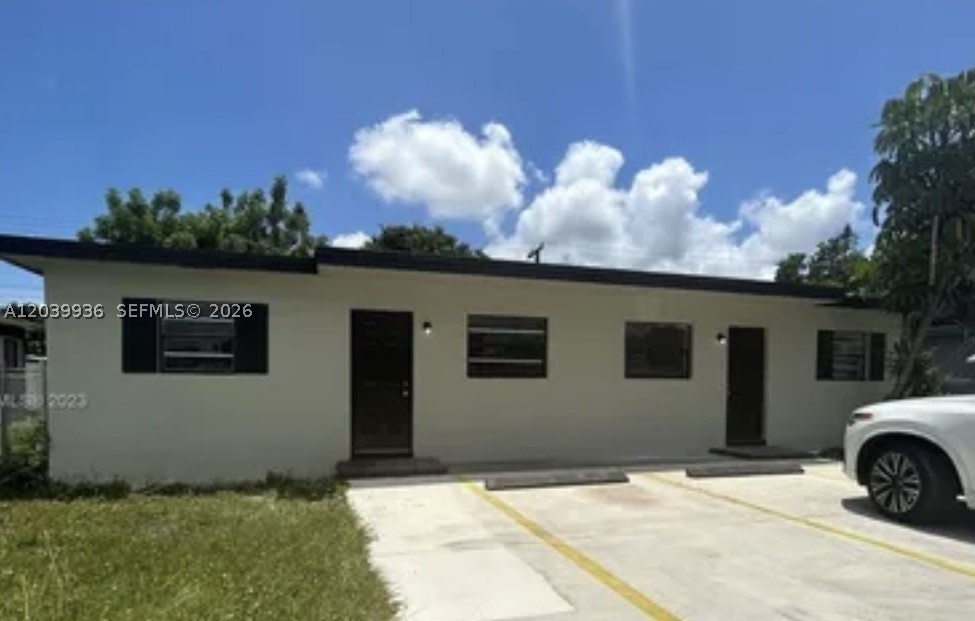 This beautiful duplex offers two spacious units with a brand new roof, each with two bedrooms and one bathroom. With a fresh exterior and modern finishes, this property is perfect for investors or owner-occupants seeking rental income. The kitchens feature beautiful cabinetry, and the open living space is inviting. Centrally located with easy access to US-1, the Florida Turnpike, and the Metrorail, zoning allows for additional units to be built on this large lot. The expansion possibilities are endless, making this property a fantastic investment. Please do not disturb the tenants.