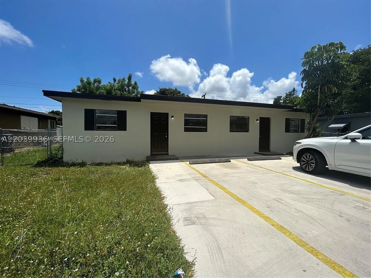 This beautiful duplex offers two spacious units with a brand new roof, each with two bedrooms and one bathroom. With a fresh exterior and modern finishes, this property is perfect for investors or owner-occupants seeking rental income. The kitchens feature beautiful cabinetry, and the open living space is inviting. Centrally located with easy access to US-1, the Florida Turnpike, and the Metrorail, zoning allows for additional units to be built on this large lot. The expansion possibilities are endless, making this property a fantastic investment. Please do not disturb the tenants.