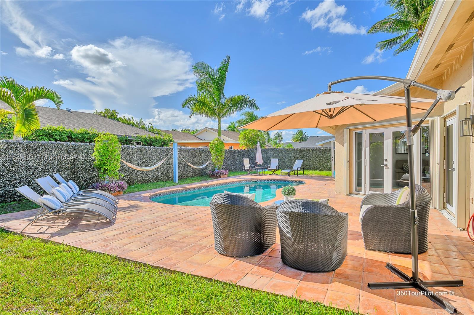 A MUST SEE!!!BEATIFUL HOME COMPLETED RENOVATED AND TASTEFULLY DETAILED, OVERSIZED PATIO AND POOL AREA. OPEN KITCHEN WITH BIG STORAGE AND MODERN DESIGN, WITH LUXURY ACCESORIES, QUARTZ IN COUNTER TOP. GOOD BRAND NEW ROOF 3 YEARS OLD, ACCORDION SHUTTERS, BRAND NEW AC UNIT, CEILINGS WITH RECED HIGH HATS, SMART OUTLETS ANS SWITCHES ALL HOME,  FENCED BACKYARD, CLOSE TO TOWN CENTER AND BONAVENTURE CLUB HOUS