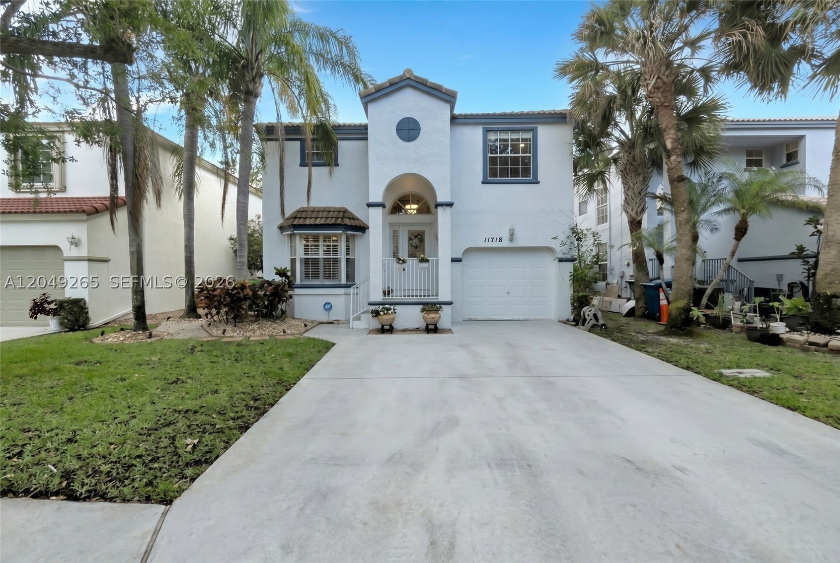 Welcome to this beautifully updated 3-bedroom, 2.5-bath two-story home in the desirable West Glen Manor community of Coral Springs. Featuring luxury vinyl and marble flooring, this beautiful residence offers a warm and inviting floor plan with an updated kitchen completed in 2026, showcasing quartz countertops, wood cabinetry, stainless steel appliances, and a stylish glass backsplash. The bathrooms feature elegant marble finishes, while the half bath was remodeled in 2024, and additional flooring updates enhance the home's modern appeal. The garage has been thoughtfully converted into a dedicated laundry room, adding convenience and functionality but can be converted back to a garage if needed. Enjoy a private patio and the convenience of a low HOA that includes lawn maintenance, exterior painting, tree trimming, and access to the community pool. Ideally located near major highways, as well as parks, schools, shopping, and dining, this move-in ready home offers comfort, convenience, and an exceptional Coral Springs lifestyle.