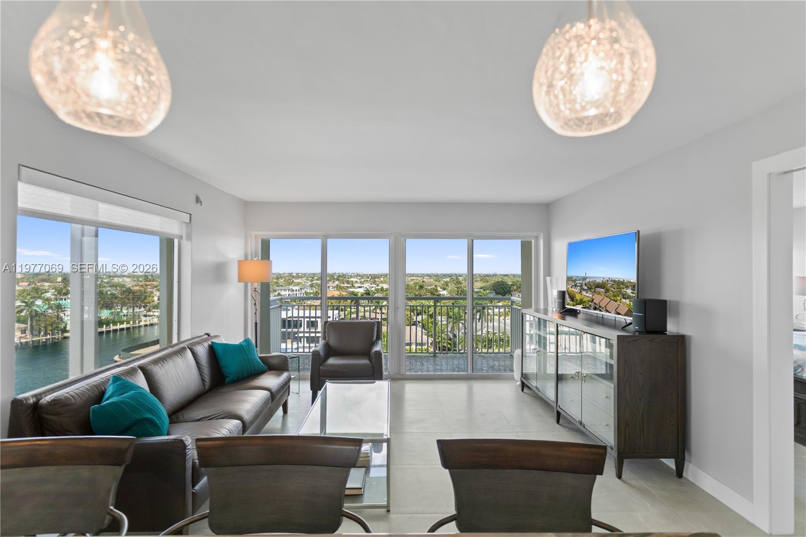 Experience stunning unobstructed views of the Atlantic Ocean, Hillsborough inlet lighthouse, and "millionaires mile", from this completely renovated luxury ninth floor corner unit, located directly on the intracoastal waterway. Enjoy magnificent sunsets, a daily boat parade, and an abundance of marine life from your personal balcony. Additionally, private gated beach access is available. This desirable boutique condo is conveniently located within a three minute walk to a chartered fishing marina, water taxi, retail shops, and a historical public park.