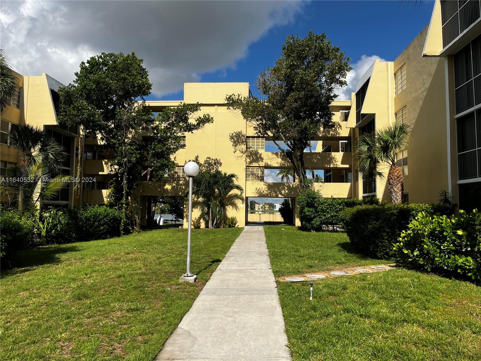 One of a kind, exquisite 2 beds, 2-baths sanctuary nestled within a coveted 55+ community, just moments away from the Aventura Mall, shopping centers, supermarkets, and the breathtaking beach. This corner unit overlooks the water from inside and is situated on the first floor. Easy access in/out to the unit from the parking lot. kitchen is perfect for everyday cooking with ample space and perfect for culinary adventures and creating gourmet delights. As you explore further, you'll discover 2 beds, thoughtfully designed to offer both functionality and opulence. The unit provides a serene ambiance and abundant natural light offering you a retreat from outside. Spacious walk in closet, tiles throughout and friendly community. Impact doors/windows. All appliances including A/C work great.