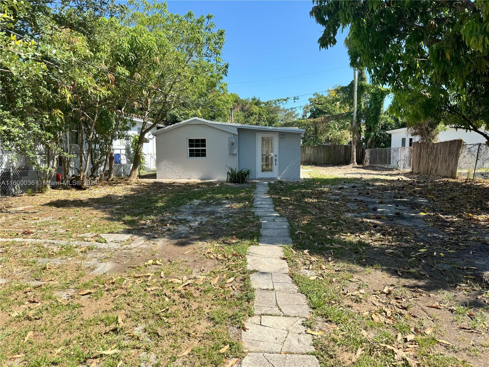 Cute as a button Cottage in Biscayne Shores just off Biscayne Blvd, close to Design District, Miami Shores, Wynwood, restaurants and supermarkets. The home features tile flooring throughout, 2 spacious bedrooms, master with bathroom inside, updated kitchen cabinets, a laundry room with washer and dryer, a very expansive yard for your toys, work trucks or entertaining. Fruit trees include a mango tree.