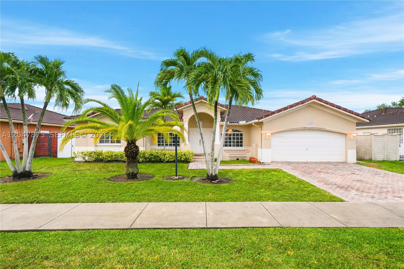 Welcome to this exceptional residence, offered for the first time after years of proud ownership. Impeccably maintained and in pristine condition, this home is move-in ready while offering the perfect opportunity for a new family to add their personal touch and make it their own.

Featuring soaring high ceilings and a desirable split-bedroom floor plan, the home provides an ideal balance of comfort, privacy, and functionality for everyday living. Nestled within a private, sought-after neighborhood, you'll enjoy peace of mind while being just minutes from Miami's finest shopping, dining, top-rated schools, parks, and major conveniences.

Whether you're looking for your forever home or a place to create lasting memories, this is a rare opportunity to own a beautifully cared-for property in one of Miami's most desirable family-friendly communities.