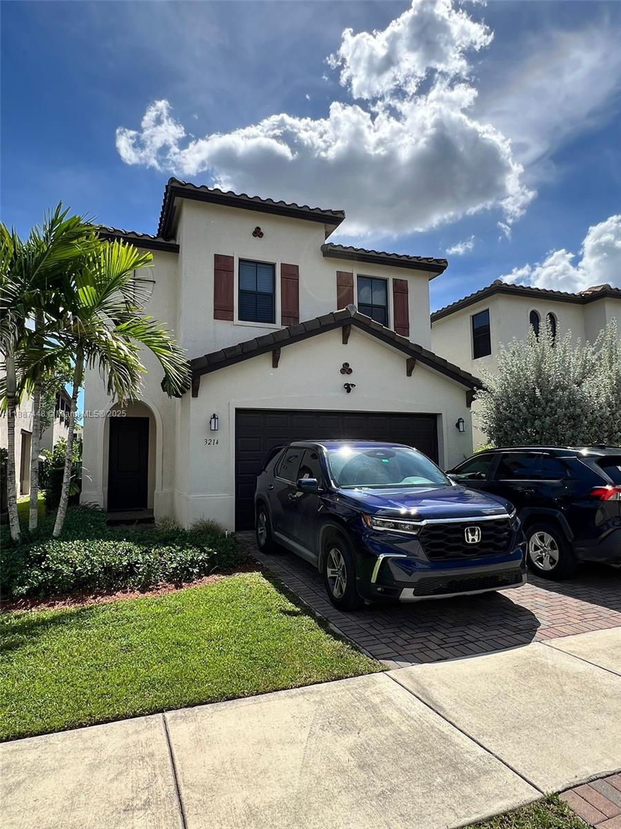Move-in ready by January 1, 2026 in Hialeah Gardens! This 3-bed, 2-bath, and a half home features a bright, open living/dining area and an updated kitchen, stainless steel appliances, perfect for everyday cooking and weekend entertaining. The owner’s suite offers a walk-in closet, double vanity, with comfortable secondary bedrooms and well-appointed baths. Enjoy a private, low-maintenance patio for BBQs, pets, or play, 2016 roof, 2016 A/C | indoor laundry | garage for 2 cars. Prime location near I-75 & 826, minutes to shopping, dining, parks, and everyday conveniences—and just a short drive to the planned American Dream Miami mega entertainment & shopping destination off I-75, a long-term value add for the area. Bonterra Homeowner Association managed by KW Management. See it today!