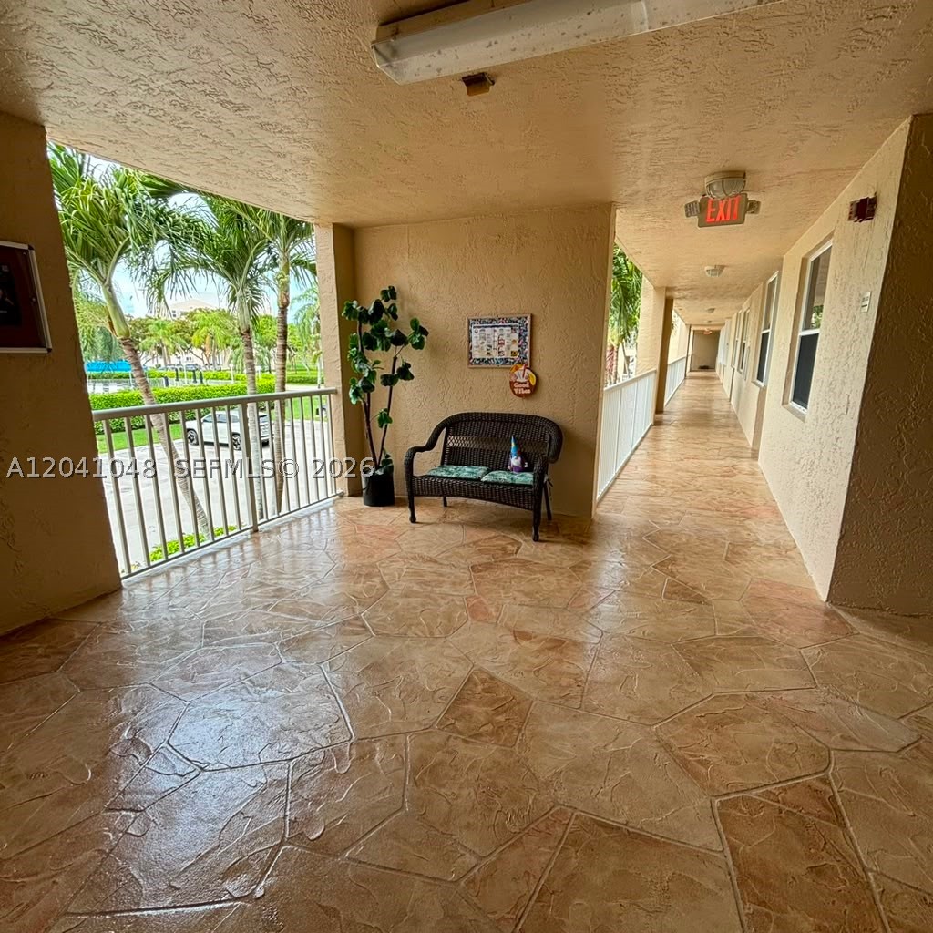 Welcome to this well-maintained 2-bedroom, 2-bath condo located in the desirable Sunrise Lakes community. This second-floor unit offers a spacious floor plan with abundant natural light, a large living and dining area, and a screened balcony perfect for relaxing and enjoying the Florida lifestyle. The primary suite features a walk-in closet and private bath. Conveniently located near shopping, dining, entertainment, golf courses, and major highways. Community amenities include clubhouse, pool, fitness center, and social activities. Excellent opportunity for seasonal residents, year-round living, or investors where permitted by the association. Schedule your showing today.