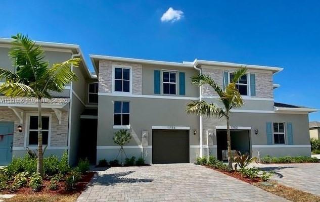 Highly desired Townhouse in Marbella Community! 
Beautiful 3 bedrooms, 2.5 baths with 1 car-garage townhouse in Homestead. 
Whirlpool stainless-steel appliances, quality crafted cabinets, ceramic tile, paver driveway & porch. Home is Connected, America’s Smart Home System! The amenities include a community clubhouse, swimming pool & lake. Marbella is within proximity to Florida Keys Outlet Marketplace, Florida’s Turnpike, local farmer markets, tasty restaurants, and the beautiful Florida Keys! Schools: Gateway Environmental K-8 Learning Center, Homestead Middle School, Homestead Senior High School Nearby: Homestead Miami Speedway, Homestead Air Reserve Base, Homestead Hospital, Ocean Reef Club.