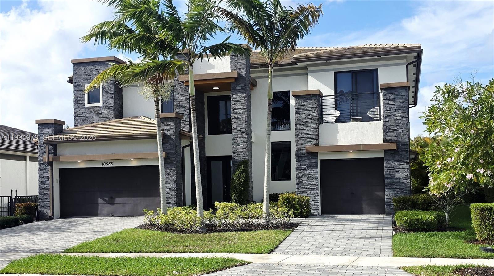 Motivated Seller—Price reduced - Furniture is included - Welcome to The Victoria in Cascata, Parkland's Premier Gated Community. This stunning two-story residence offers 6 bedrooms, a den, a spacious loft, and 7 bathrooms. The main living area impresses with soaring 20-foot ceilings and abundant natural light, seamlessly connecting the formal living room, family room, game room, and den. All opening to a terrace perfect for indoor-outdoor living. The gourmet kitchen features premium stainless steel appliances, upgraded European cabinetry, and generous counter space, ideal for hosting and daily use alike. Designer finishes throughout include upgraded flooring, European wall coverings, and custom luxury light fixtures. Ample storage and a highly functional layout make this home as practical as it is beautiful.
The first-floor primary suite is a true retreat, offering direct backyard access, coffered ceilings, two walk-in closets, and a spa-inspired bath with a jetted Roman tub and dual-head shower. Upstairs, five additional bedrooms and an oversized loft provide flexible space for guests, a home office, or leisure. The expansive backyard offers a terrace with ample room to add a custom pool. A private outdoor haven to enjoy South Florida living year-round. Smart home-ready infrastructure allows seamless integration of modern technology throughout. Situated on a corner lot, larger than standard. Furniture is included.