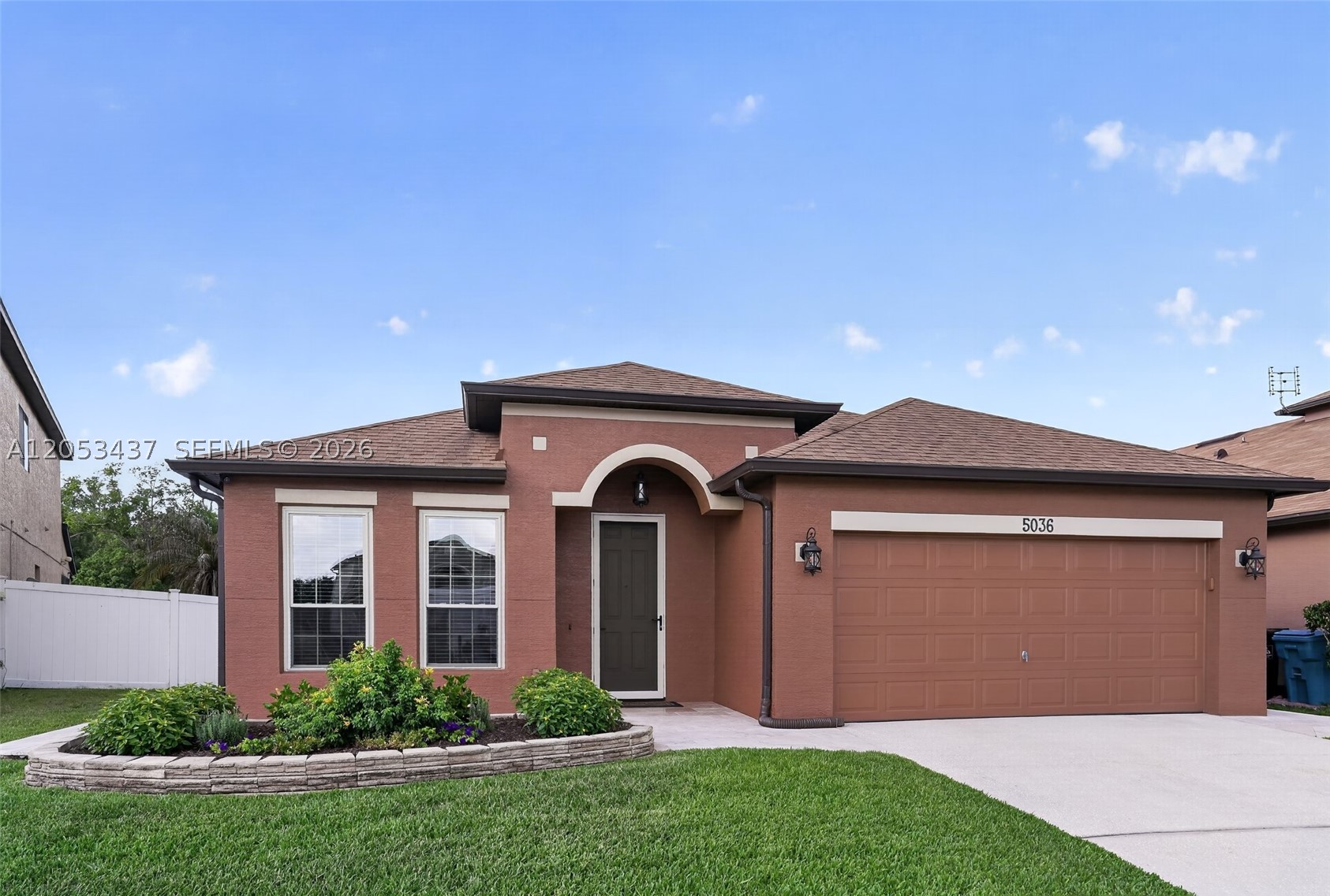 Discover this stunning 4-bedroom home in Orlando, a Totally Upgraded Home Inside and Out, thoughtfully renovated to provide comfort, style, and functionality. The property is Listed at Current Appraised Value of $483,000, offering exceptional value in today's market. The recently remodeled kitchen combines modern design with everyday practicality, while the Remodeled Bathrooms add a touch of elegance throughout the home. Spacious living areas provide the perfect setting for both relaxation and entertaining. The living room features a beautiful Built-In Entertainment Center with Fireplace, creating a warm and inviting atmosphere for family gatherings and cozy evenings at home. Additional upgrades include installed light fixtures and ceiling fans, two mounted TVs, security cameras, garage storage cabinets, a whole-house water filtration system, and a pergola that is perfect for enjoying the backyard. The attic is equipped with pull-down stair access, lighting, and insulation to help improve energy efficiency and reduce heat. Outside, you'll find mature trees and peaceful canal views, offering a private and serene outdoor setting. Residents enjoy access to outstanding community amenities, including a swimming pool, parks, and recreational common areas that enhance the Florida lifestyle. Move-in ready and meticulously maintained, this home offers the perfect combination of quality, comfort, and convenience.