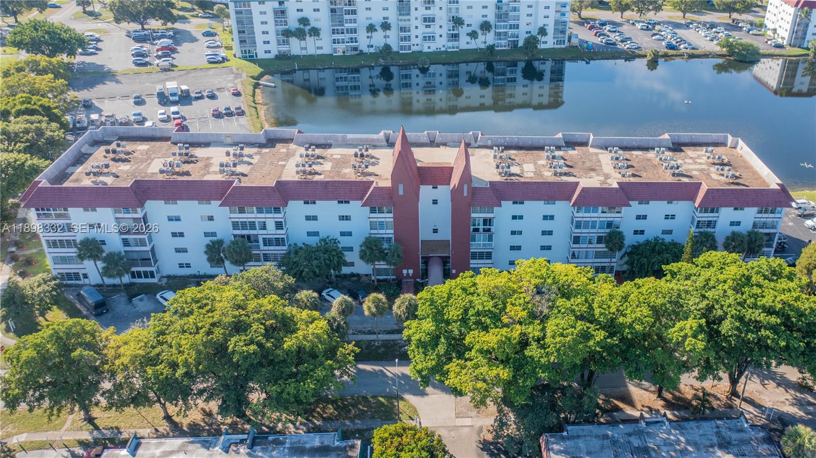 BEST PRICED FURNISHED UNIT WITH TWO FULL BATHROOMS IN THE BUILDING! Rare opportunity to own one of the few 1-bedroom units with 2 full bathrooms in desirable Castle Gardens 55+ community. Fully furnished and move-in ready with private balcony, assigned parking, and beautifully maintained interior. Low HOA, no current special assessments, and milestone inspection completed and passed. Excellent opportunity for seasonal or full-time South Florida living under $100K.