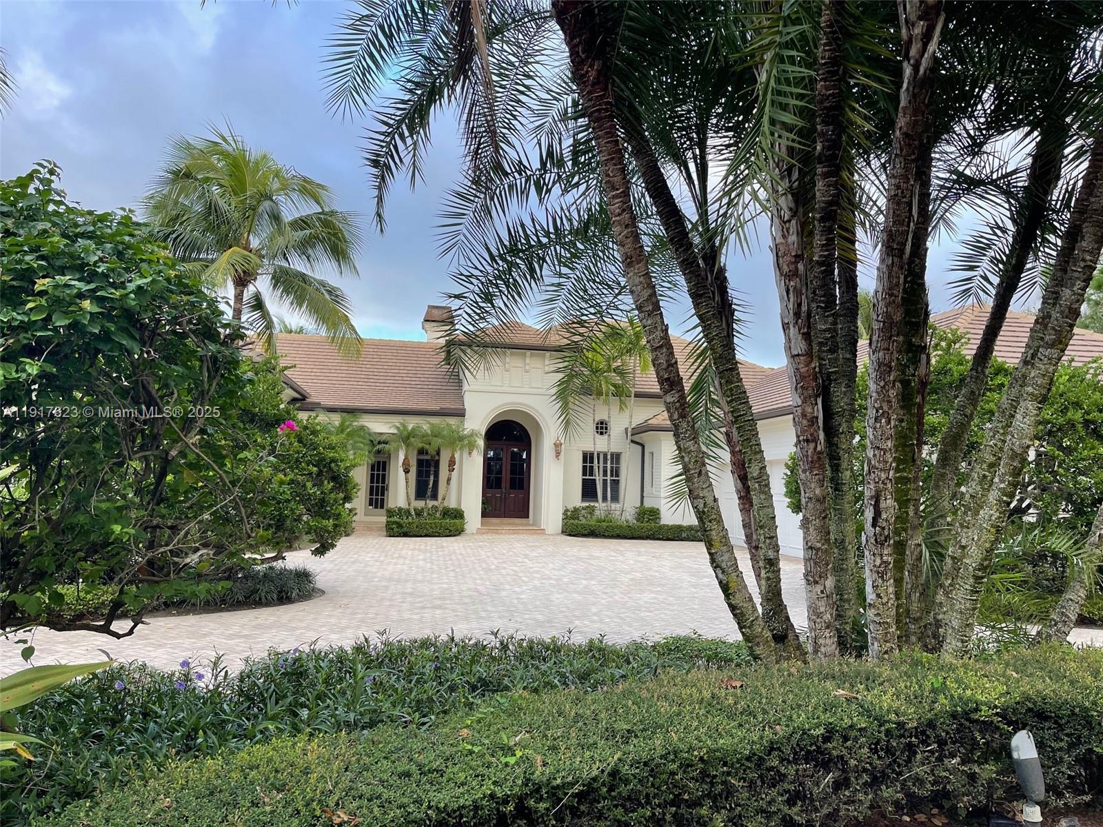 Located in the prestigious gated community of Old Marsh, this residence offers direct views of the of the first hole of the Pete Dye Championship golf course. Featuring a well-designed split floor plan, the home boasts 4 spacious bedrooms and 4 full baths. The recently upgraded gourmet kitchen opens into a large family room, perfect for both entertaining and relaxed living. The spacious living room, complete with coffered ceilings and fireplace, adds a touch of warmth and sophistication. The expansive primary suite is a true retreat, featuring tray ceilings, sitting area, 2 large walk-in closets, dual vanities, bathtub and separate shower. Additional highlights include a dedicated office space, screened patio with pool, spa, and outdoor kitchen.
