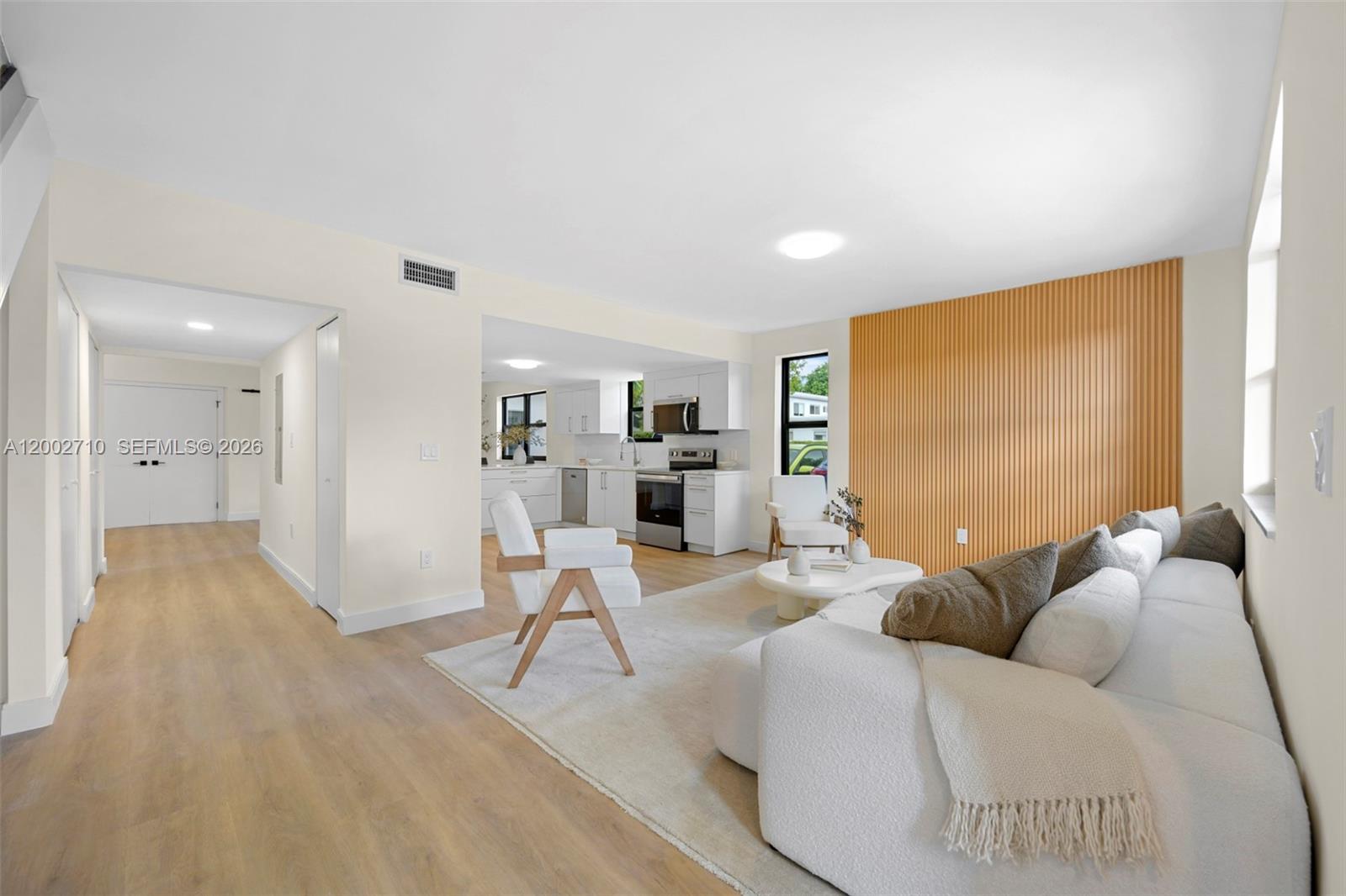 Fully renovated Miami Beach townhome just steps from the ocean. This spacious 5BD/3BA residence offers nearly 2,000 SF under A/C across two levels, featuring private balcony, and abundant natural light throughout. Enjoy a large private front yard and patio, perfect for outdoor living and entertaining. The modern layout includes a dedicated laundry room and 2 assigned parking spaces. Upgrades include hurricane-impact windows, indoor and outdoor LED lighting, an elegant staircase, and lush, modern landscaping. Designed by a top interior designer with premium finishes and a clean, contemporary style. Located in a quiet residential neighborhood near top-rated schools, beaches, parks, restaurants, and premier shopping. Move-in ready.