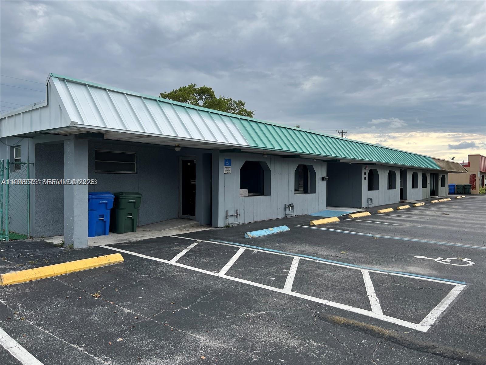 Free standing building located in the busy business district of Oakland Park. Ample business possibilities due to B-2 zoning and Commercial Opportunity Zone. 3,920 S/F with 4 bathrooms. Front parking spaces and fenced in back yard. Passed 40 year inspection.
