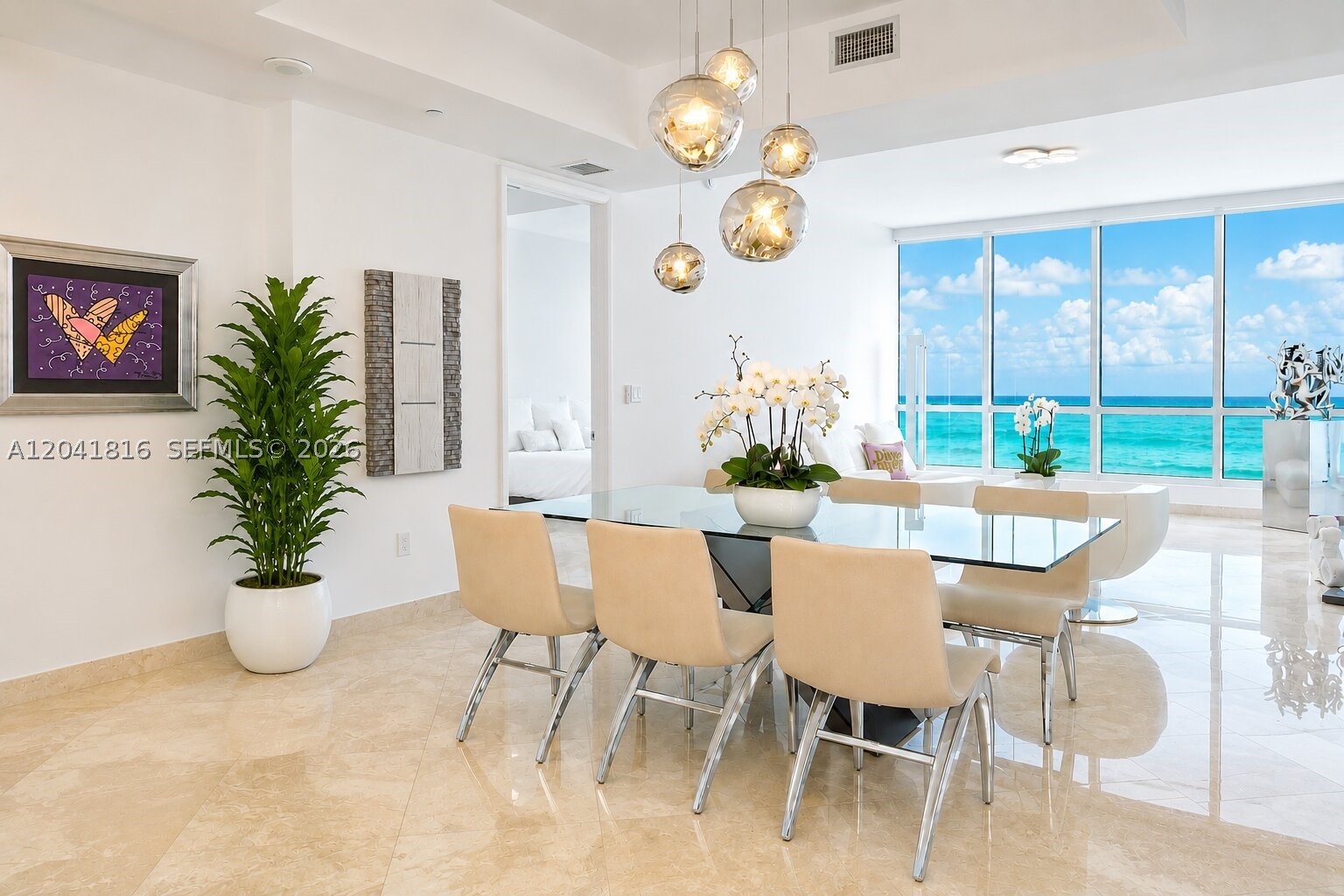Rarely available a fabulous modern fresh ocean front 2 bed 2 1/2 bath at the Continuuum South Tower. Walking off the elevator through the private foyer one is dazzled by the stunning views of sparkling turquoise ocean and powder blue skies. 1870sq ft of an impeccable, intelligent design that truly maximizes this bright, elegant, and cheerful space. 
The home features a beautifully updated entertainer’s kitchen featuring Miele and Subzero appliances this is truly one of the Continuum’s premium residences all front and center of this world renowned resort and amenities. With sweeping views all the way up Miami Beach , mid point in the building one sees layered lush landscaped gardens, gorgeous pools and vast ocean vistas confirming that this particular home is the epitome of the life style associated with class and luxury. Just call it “Fabulous elegance on the beach”