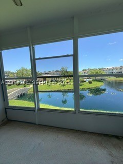 Amazing opportunity to own a second-floor condo with a lovely water view in the desirable 55+ community of Hawaiian Gardens. This unit offers tile flooring throughout the main living areas, carpet in the bedroom, and an impact window in the living room. The enclosed balcony is unfinished and provides flexible space that can be transformed into a sitting area, hobby room, home office, or additional storage.

The condo does need some updating, making it a great opportunity for a buyer to personalize the space and add value. Conveniently located near shopping, dining, medical centers, entertainment, major highways, and approximately 30 minutes from the beach. Priced to sell quickly—don’t miss this opportunity to enjoy comfort, convenience, and peaceful community living.
