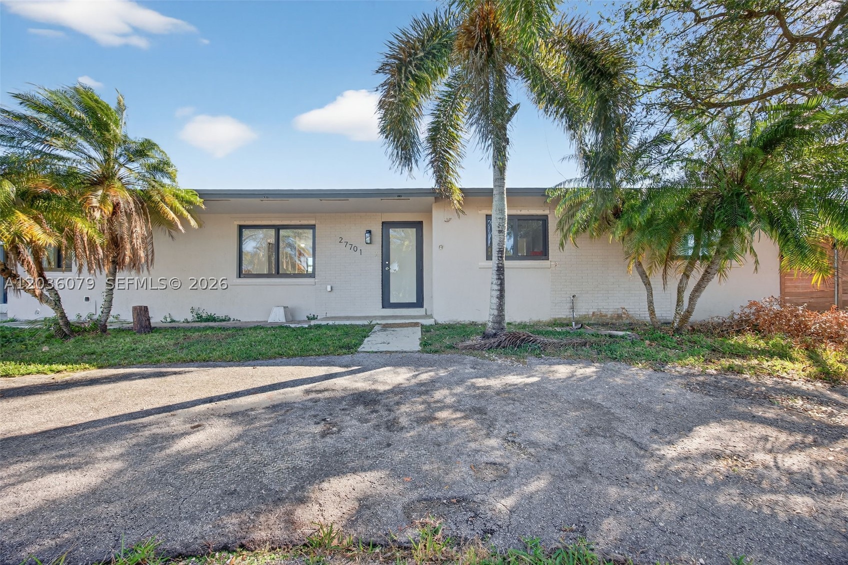 NO HOA! NEW ROOF (2021). IMPACT WINDOW AND DOORS! Single-Family home with a large POOL (RESURFACED 2022)! Large side space to fit RVs and Boats! Ample driveway to fit multiple cars! Features an IN-LAWS SUITE with a private entrance and a kitchenette area. Home features a spacious living area with plenty of natural light. Open kitchen layout with stainless steel appliances and plenty of cabinetry space. Gas Stove. French doors lead to a patio and a pool with a convenient cabana bath.