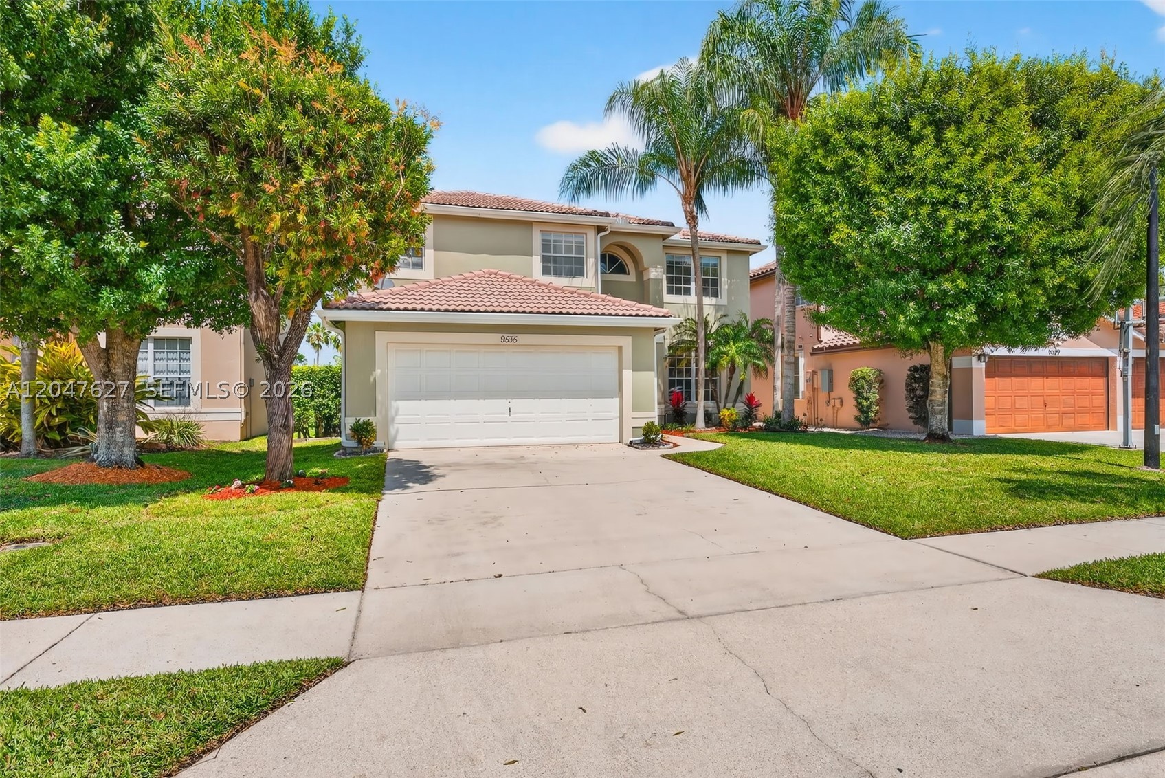 Beautiful 4-bedroom, 3-bath single-family home located in a gated community within a top-rated school district. This home features a spacious master bedroom and bath, offering comfort and privacy. Recently remodeled and upgraded, the property boasts updated bathrooms, new flooring, and fresh paint throughout. Enjoy stunning lake views and access to community amenities. Located in a top-rated school district and within walking distance to shopping and dining, this home is part of a vibrant community with resort-style amenities including a pool, gym, tennis, basketball courts, playground, and more. Virtual Staging Disclaimer: Some images have been virtually staged and digitally enhanced for illustrative purposes only, including living areas, bedrooms, and outdoor patio spaces. Furniture, décor and features shown—such as outdoor furniture, BBQ setup, exterior garage lamps lighting and the tiled sink/brick area—are virtually staged and digitally enhanced and do not exist in the property. Photos that are not virtually staged are also provided for reference.