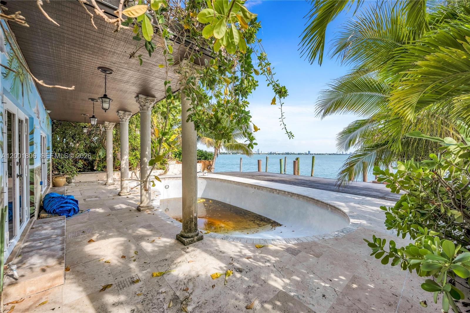 A Rare Wide Bay Waterfront Property and opportunity to acquire a prime waterfront, unobstructed, panoramic bay and downtown Miami skyline views. Situated on an 8,850 SF lot this property offers the ultimate Miami waterfront lifestyle — with no fixed bridges to the ocean for seamless boating access. Existing grandfathered boat dock pilings significantly enhance the property’s value.

Offering RM-1 zoning, this site presents compelling redevelopment potential. With an allowable 1.25 FAR, the property supports approximately 12,000+/- square feet of buildable living area, with a maximum height of 55 feet. The property is non-historic, providing flexibility and a clear path toward creating a landmark waterfront estate or boutique condominium development.

Whether envisioned as a trophy single-family compound or a luxury residential project, this is a premier development opportunity in one of the most desirable waterfront corridors.