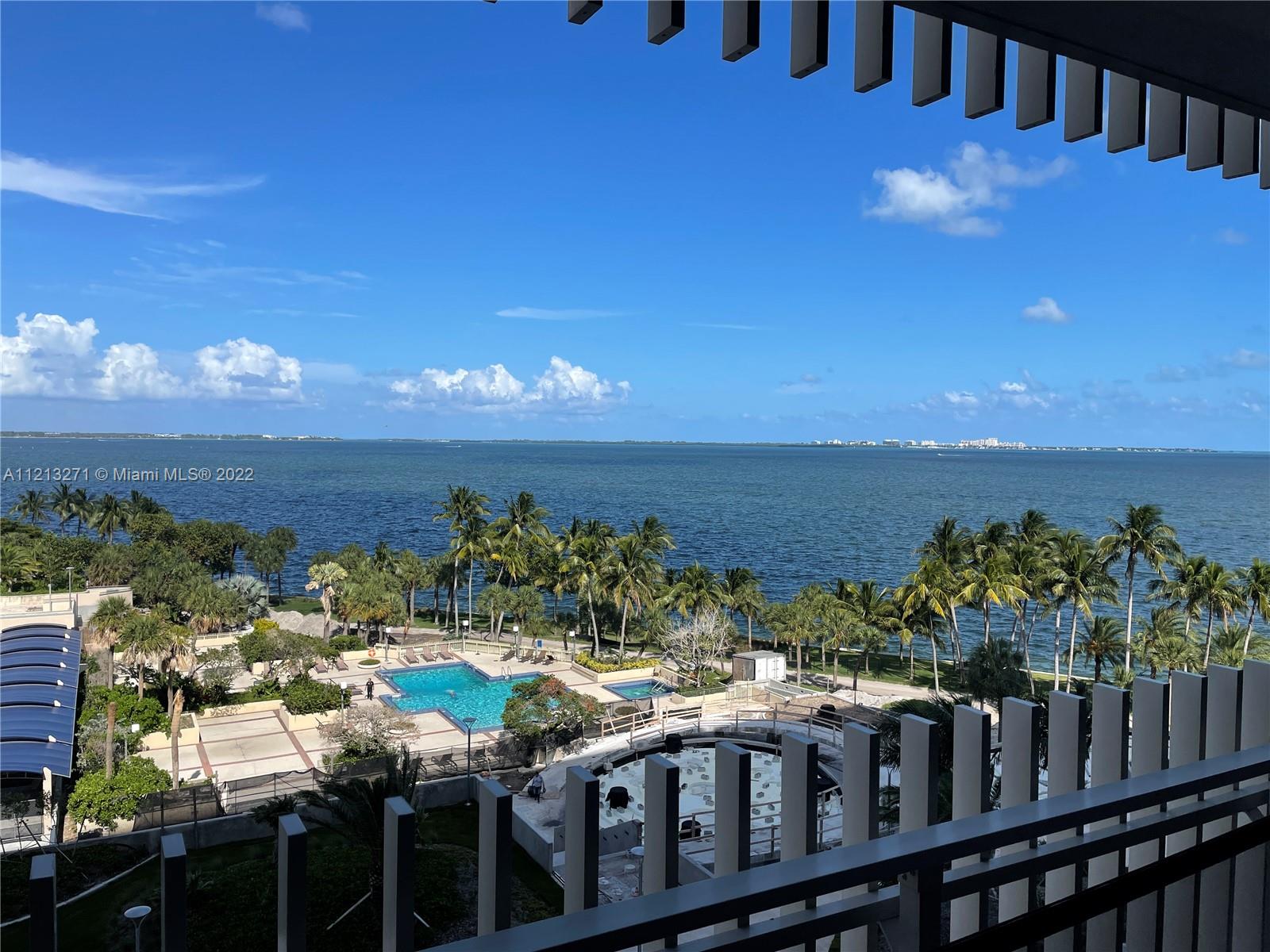 Stunning unobstructed views of Biscayne Bay, Key Biscayne, the pool and garden area. This spacious & bright 2bed/2bath unit has 1,882sf of living space and is located in Bldg. 1. Enjoy spectacular sunsets from a large balcony. Amazing opportunity to make this your perfect home. Grove Isle, a private 20 acre guard-gated community in desirable Coconut Grove, featuring a marina, pool, tennis, gym, bike/jog paths, on site management and much more.