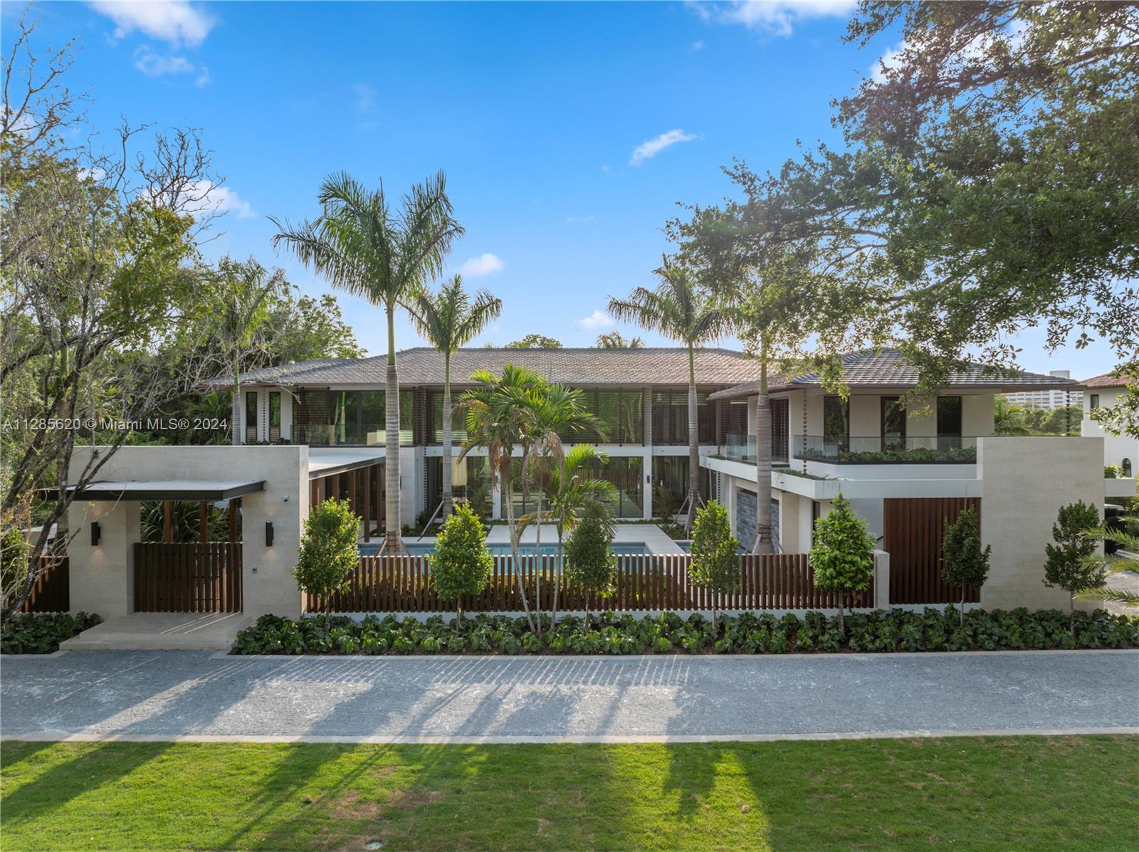 An inspiring estate that truly embodies the ultimate in luxury living. Designed by Cesar Molina of CMA, this 15K+ sq ft home elevates Tropical Modern Architecture by forming a spectacular contemporary space while effortlessly integrating natural elements. Positioned on a 50K+ sq ft lot in North Pinecrest the layout offers 7 BD, 11 BA, 2 H-BA, gym, theatre, elevator, guest house, 4 car garage, 2 MiaCucina kitchens, entertaining pavilion & expansive 85 ft pool. Masterfully designed water elements w/lush foliage & gardens create a harmonious bond within the landscape, maximum impact is delivered with the use of superb European materials & finishes. This homes unparalleled aesthetic is crafted for those striving to live an exceptional lifestyle. This modern oasis slated for completion in 2023.