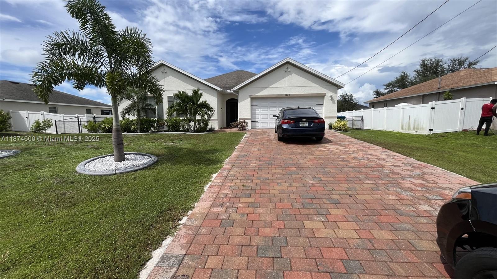 BEST PRICE!!! Enjoy comfort in this well-maintained garage home w/ 4 bedroom, 2 bathroom built in 2022. This home features an open layout w/ tile in main areas and cozy carpet in bedrooms, the home boasts a lovely kitchen with granite countertops, cherry wood cabinets, stainless steel appliances and a kitchen island with sink options. The dining area is conveniently located next to the kitchen for easy entertainment. Bathrooms have tub and shower combo and there is a separate Laundry area with Washer and Dryer. Additional highlights include irrigation system, well water and septic system. Located with easy access to schools, shopping, and Cape Coral’s best amenities, this move-in ready home is ideal for comfortable, low-maintenance living. Do not bother Tenants. Motivated Sellers !
