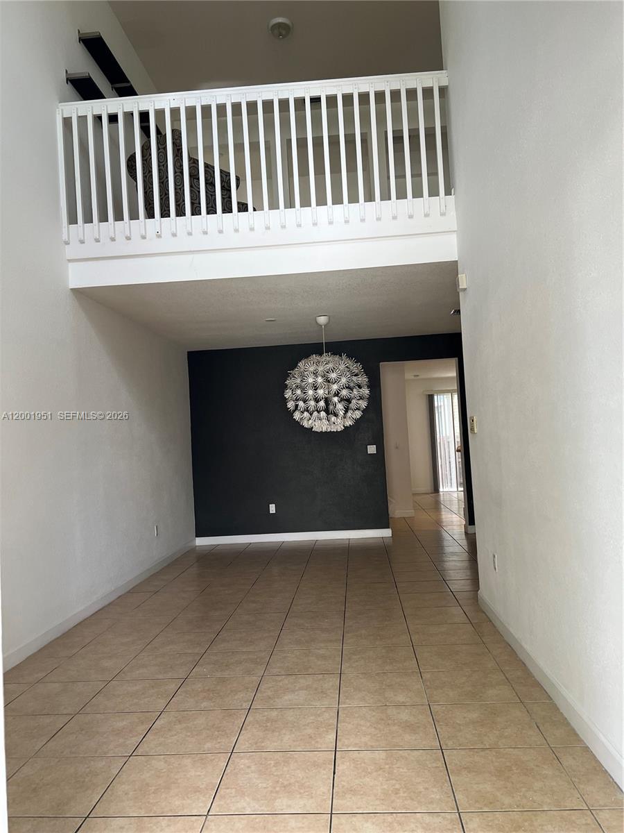 Beautiful townhouse 3 beds, 3 bathrooms , very spacious  unit, located right in front of the clubhouse at the exclusive "Reserve at Doral West." It has an ample open kitchen with granite countertops and stainless-steel appliances, Diner area, breakfast area, laundry room, walk-in closets, 2balconies, conditioned walk-in attic and a studio loft. Lots of storage space .  modern stair case, all 3 bathrooms were completely renewed. Cozy gated community with security, a beautiful clubhouse with pool, gym, billiard table, social area, playground & more.
Driving Directions: Very well located, one block from the exit to the Turnpike. Three blocks away from Doral Legacy Park. Easy access to restaurants, shopping, schools and just 20 minutes to Miami International Airport.
Broker Remarks: Easy to Show , For showings text office  agent.
