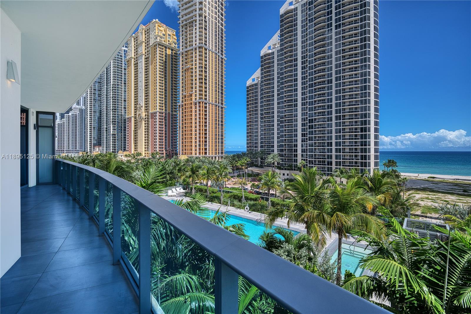 Step into modern sophistication at Aurora, Sunny Isles Beach’s newest boutique address.
This beautifully furnished residence features 2 spacious bedrooms, a versatile den, and 2.5 bathrooms, offering the perfect blend of comfort and style. The open living area flows seamlessly onto a large terrace with serene ocean views, perfect for morning coffee or evening sunsets. High-impact glass windows, automated shades, and bespoke built-in closets enhance both comfort and style.
Aurora offers amenities: heated pool, spa, fitness center, valet, and 24-hour concierge service. Located just steps from the beach and minutes from Aventura Mall, Bal Harbour, and fine dining, this is beachside living at its most refined.