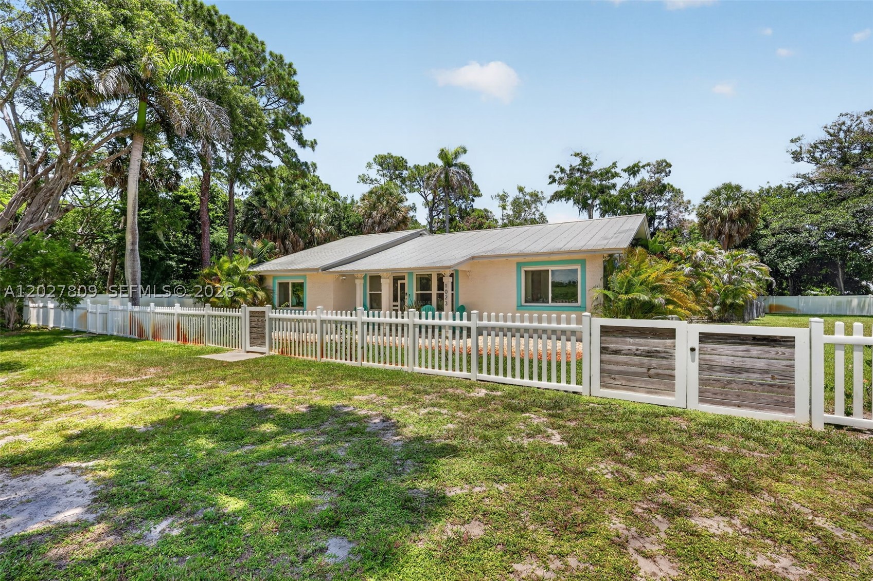 Nestled on a private half-acre lot backing to the Audubon of Martin County Nature Preserve, this fully renovated property offers a unique blend of privacy, flexibility, and location. The main residence features 3 bedrooms, 2 updated bathrooms, a spacious living room, dining area, Florida room, and an eat-in kitchen with abundant cabinetry and counter space. The primary suite includes a large ensuite bath with dual sinks and a walk-in shower. A rare downstairs 1-bedroom, 1-bath guest quarters with its own kitchen provides additional living space for guests, extended family, multi-generational living, or potential rental income. Outside, enjoy a private inground pool surrounded by tropical landscaping, expansive patio areas, and peaceful preserve views. The fully fenced property offers room to relax, entertain, and enjoy the outdoors while maintaining a sense of privacy rarely found this close to town. Conveniently located between Downtown Stuart and Hutchinson Island, you'll be just minutes from beaches, boating, waterfront dining, shopping, and all that the Treasure Coast lifestyle has to offer.