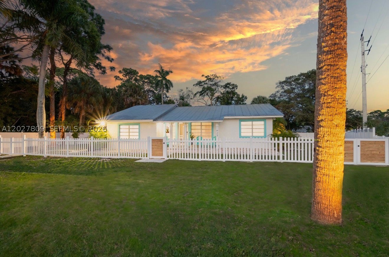 Nestled on a private half-acre lot backing to the Audubon of Martin County Nature Preserve, this fully renovated property offers a unique blend of privacy, flexibility, and location. The main residence features 3 bedrooms, 2 updated bathrooms, a spacious living room, dining area, Florida room, and an eat-in kitchen with abundant cabinetry and counter space. The primary suite includes a large ensuite bath with dual sinks and a walk-in shower. A rare downstairs 1-bedroom, 1-bath guest quarters with its own kitchen provides additional living space for guests, extended family, multi-generational living, or potential rental income. Outside, enjoy a private inground pool surrounded by tropical landscaping, expansive patio areas, and peaceful preserve views. The fully fenced property offers room to relax, entertain, and enjoy the outdoors while maintaining a sense of privacy rarely found this close to town. Conveniently located between Downtown Stuart and Hutchinson Island, you'll be just minutes from beaches, boating, waterfront dining, shopping, and all that the Treasure Coast lifestyle has to offer.